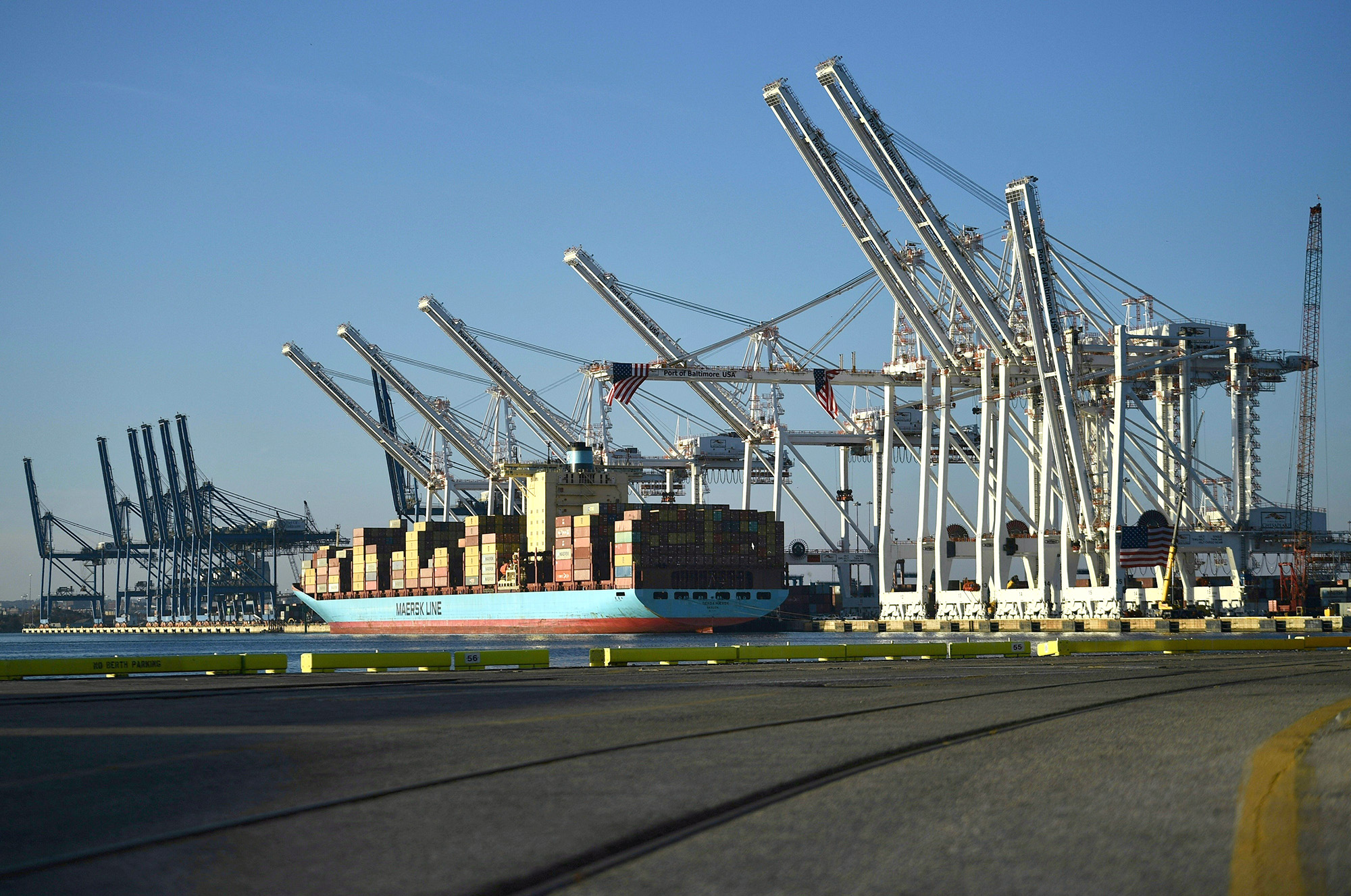 Cranes stack cargo containers at the Port of Baltimore in Baltimore, Maryland, on November 10, 2021