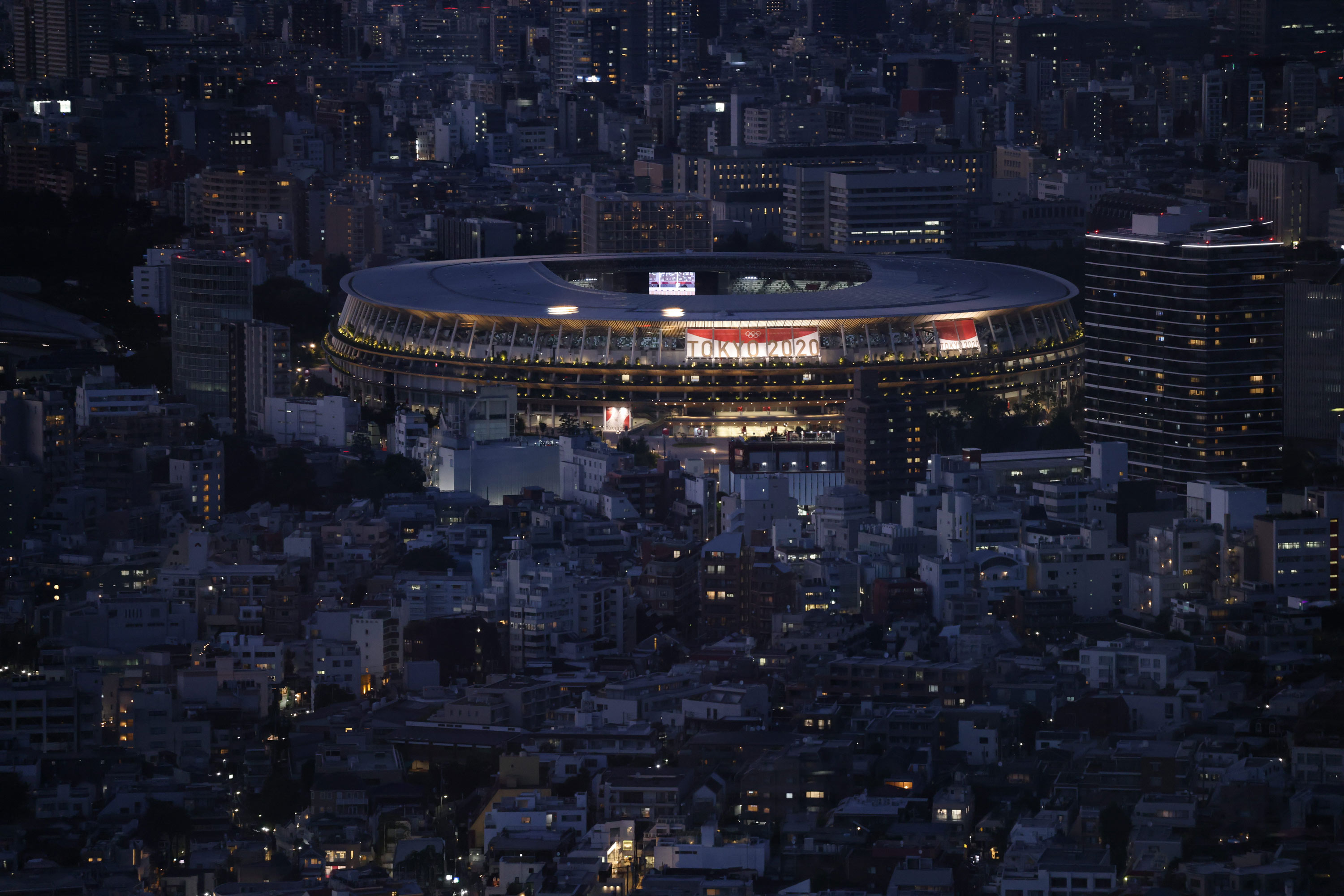 Tokyo Olympic Stadium is illuminated on July 22.