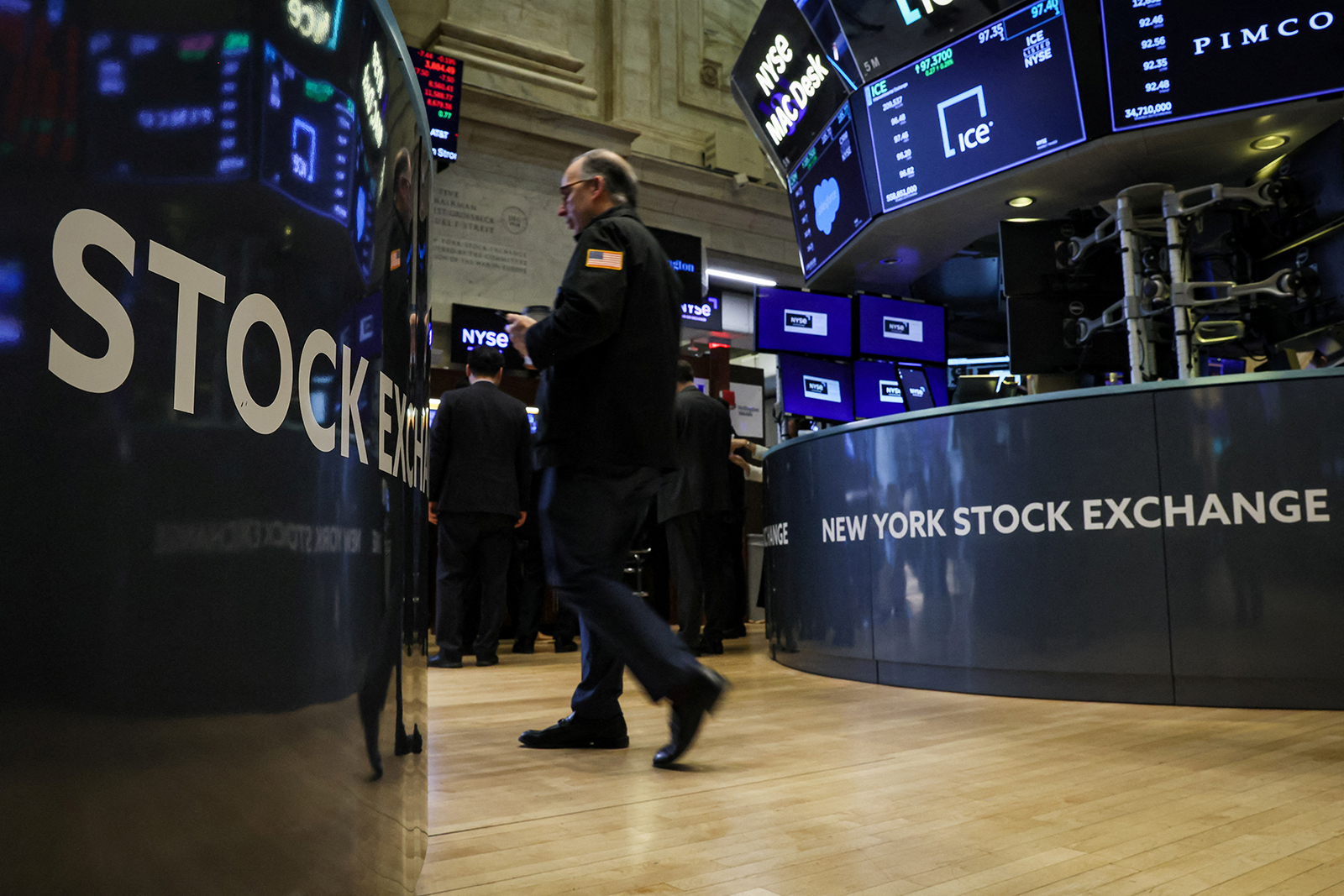 Traders work on the floor of the New York Stock Exchange on March 16.