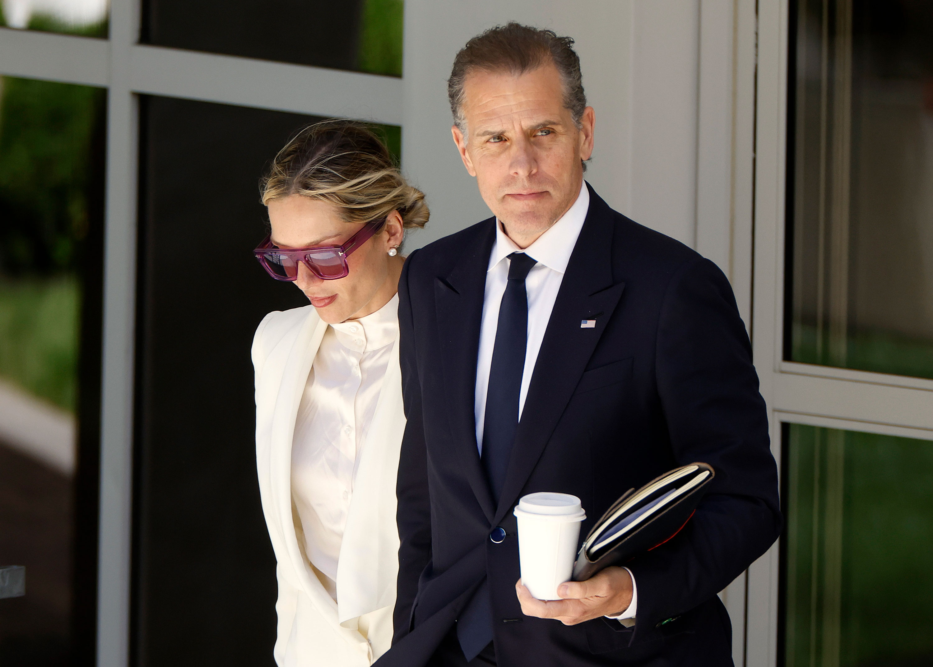 Hunter Biden and his wife Melissa Cohen Biden leave the J. Caleb Boggs Federal Building in Wilmington, Delaware, on Friday. 