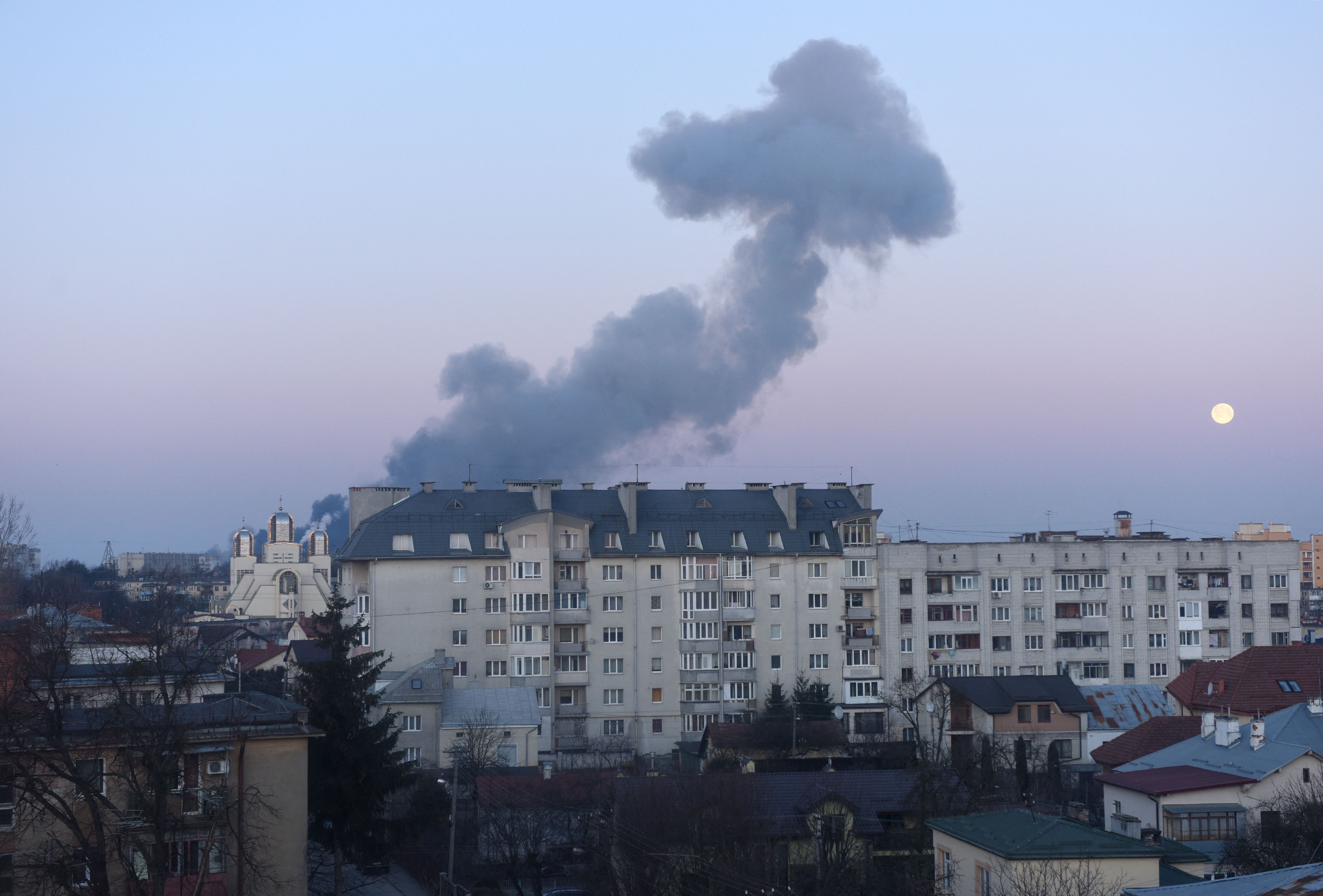 Smoke rises after an explosion in the western Ukrainian city of Lviv on March 18.
