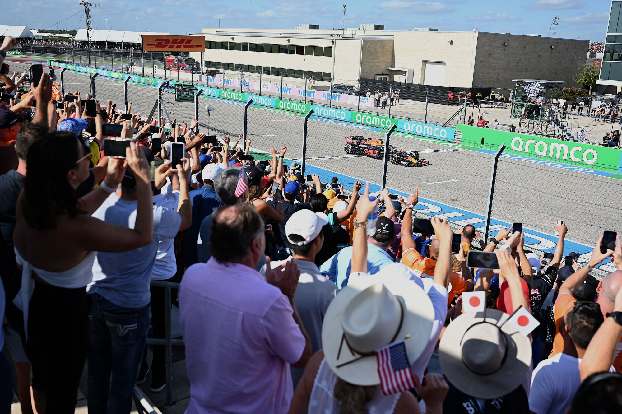 Fans cheer as Red Bull's Dutch driver Max Verstappen wins the Formula One United States Grand Prix at the Circuit of The Americas in Austin, Texas, on October 24.
