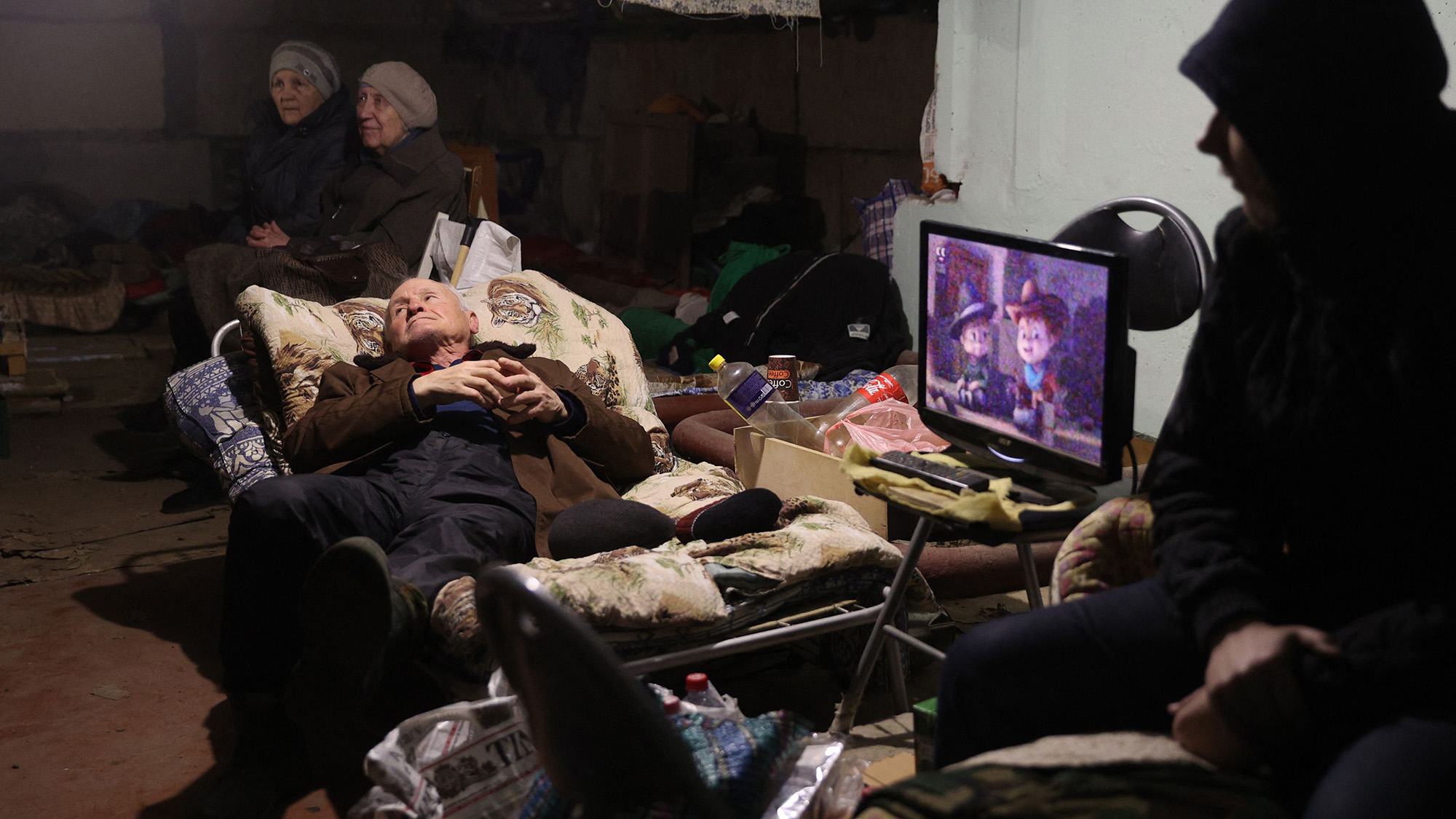 Residents shelter in the basement of a residential building to protect themselves from shelling in Lysychansk, Ukraine on April 13.