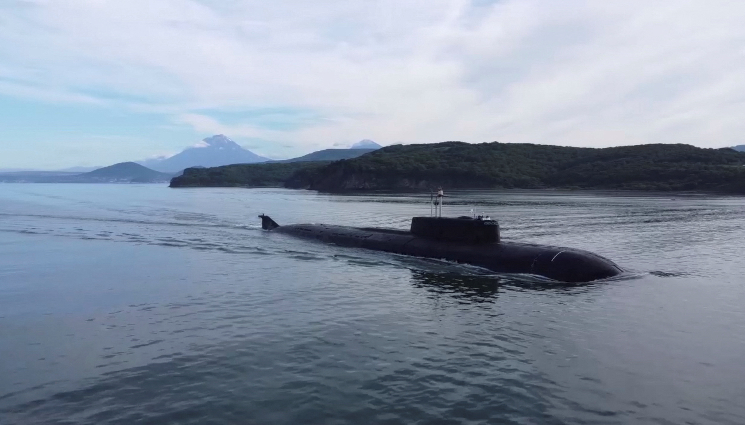 A still image from a video released by the Russian Defense Ministry shows a Russian nuclear-powered submarine sailing during the military drill in the Chukchi Sea on September 16.