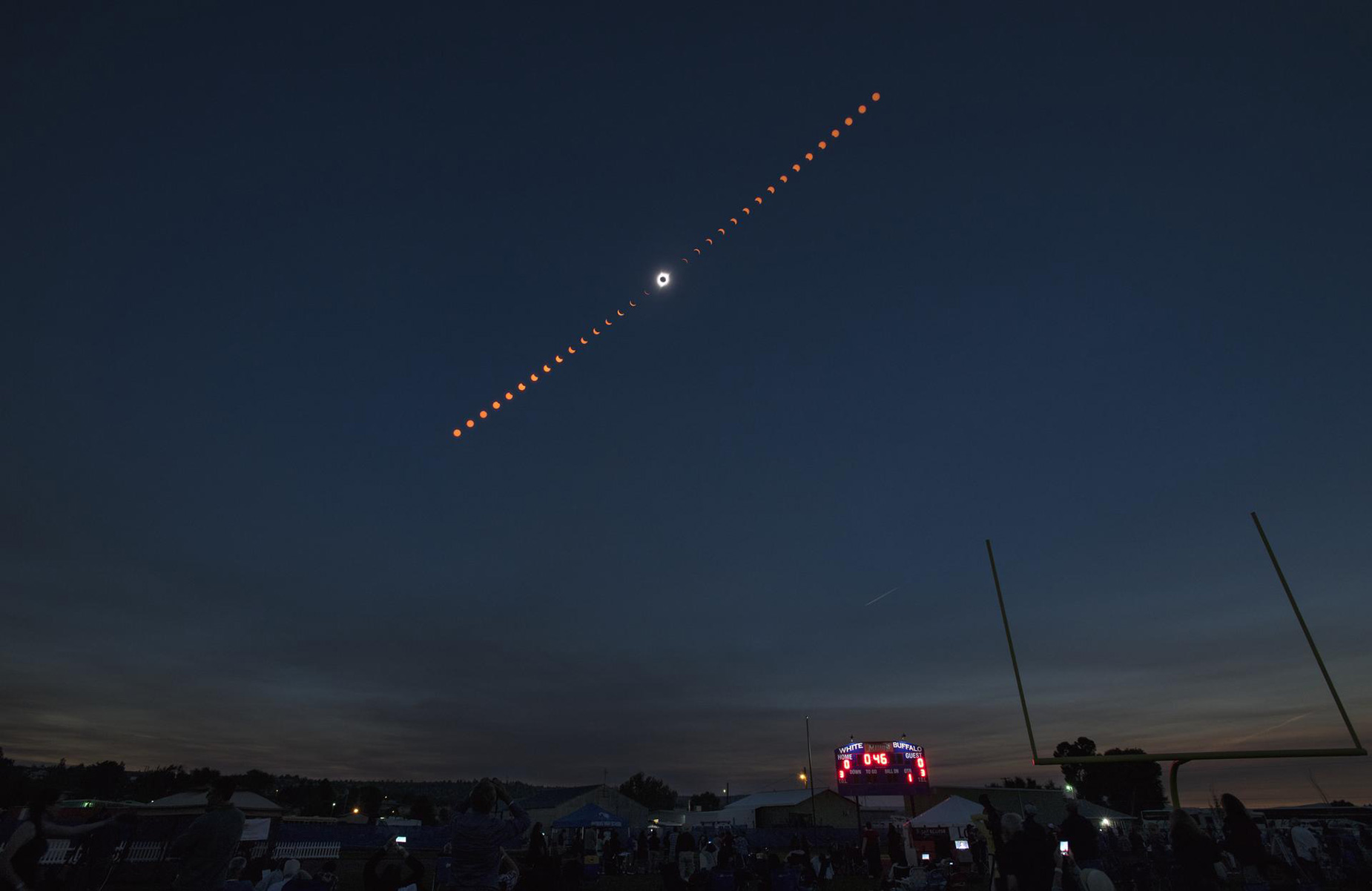 This composite photo shows the progression of a total solar eclipse over Madras, Oregon, on Monday, Aug. 21, 2017.