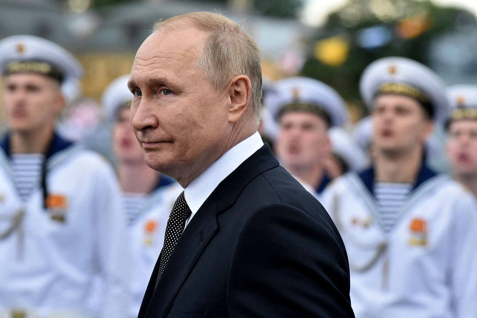 Russian President Vladimir Putin attends the main naval parade marking Russian Navy Day in St. Petersburg on July 31.