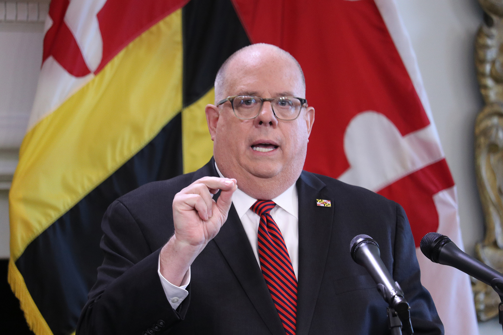 FILE - In this June 3, 2020 file photo Maryland Gov. Larry Hogan speaks during a news conference in Annapolis, Md. Gov. Hogan will be stepping down as the chairman of the the bipartisan National Governors Association. New York Gov. Andrew Cuomo takes the reins of the group representing the nation’s governors, which has played a pivotal role in communicating with the Trump administration about state needs during the coronavirus pandemic. (AP Photo/Brian Witte, file)