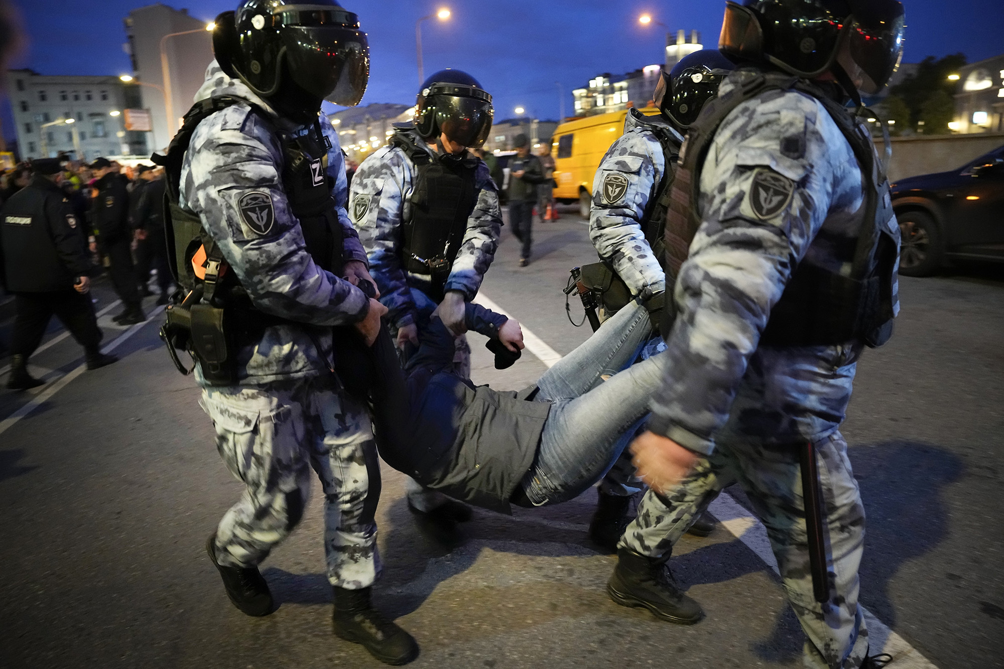 Riot police detain a demonstrator during a protest against mobilization in Moscow on Wednesday, Sept. 21.