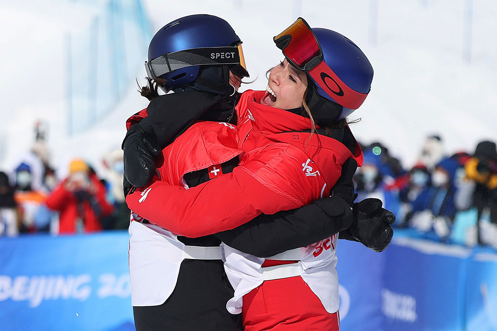 Swiss freestyle skier Mathilde Gremaud, left, hugs China's Eileen Gu after they finished 1-2 in the slopestyle finals on February 15. Both Gremaud and Gu have won two medals at these Games. Gremaud won a bronze earlier in the big air competition, while Gu won gold in that event.