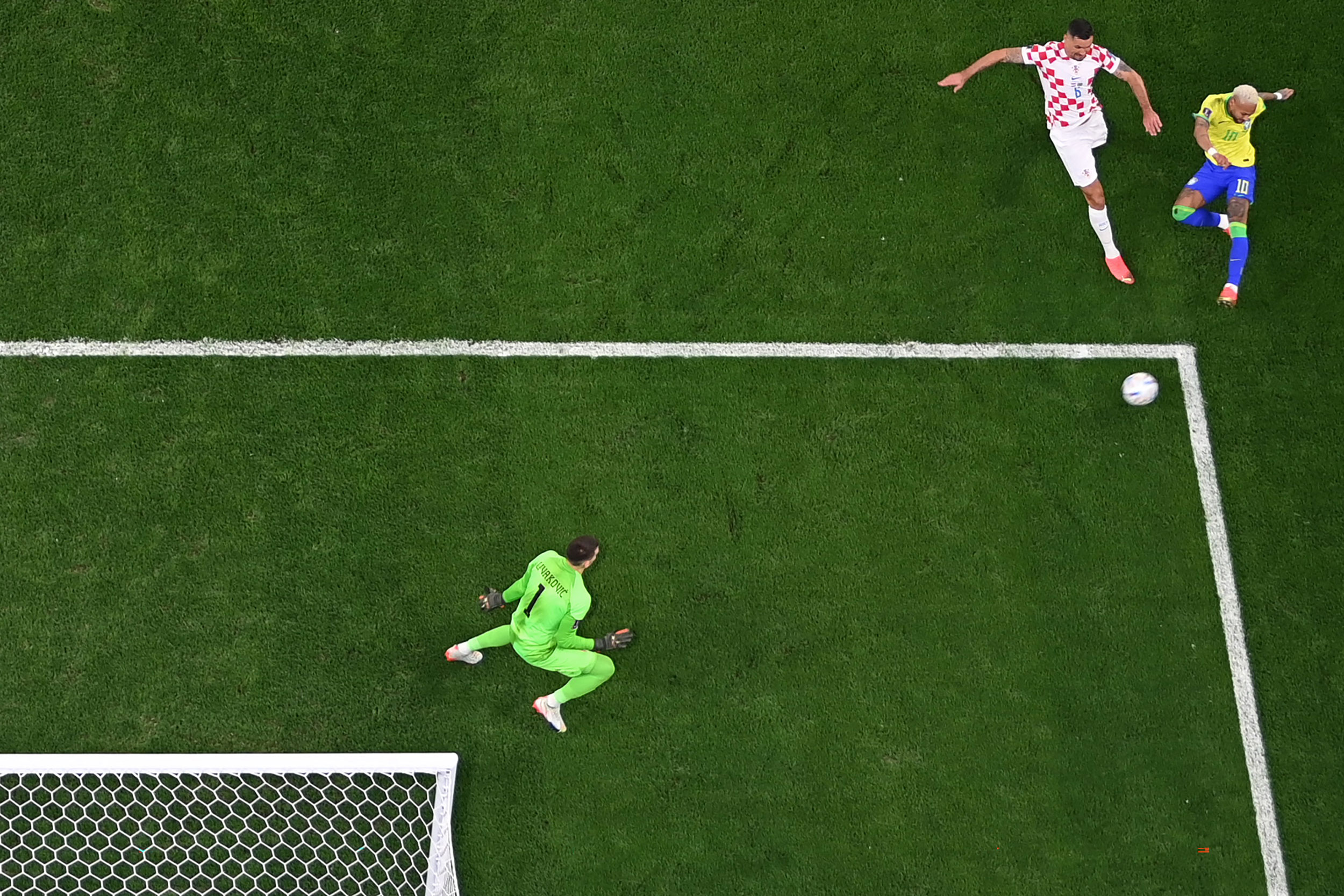 Brazil’s Neymar, right, takes a shot in the second half.