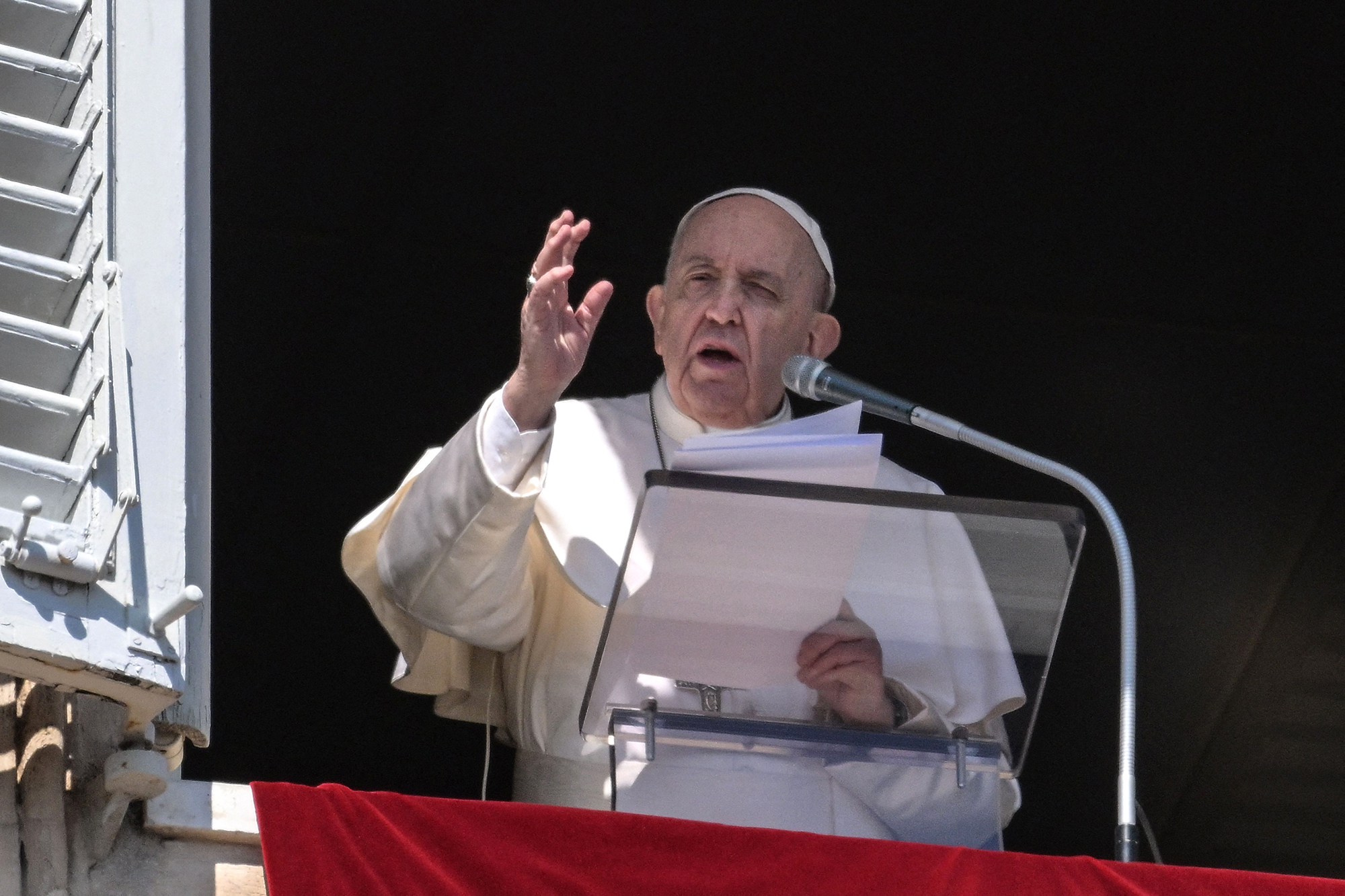 Pope Francis speaks during the weekly Angelus prayer on March 13 in Vatican City. 