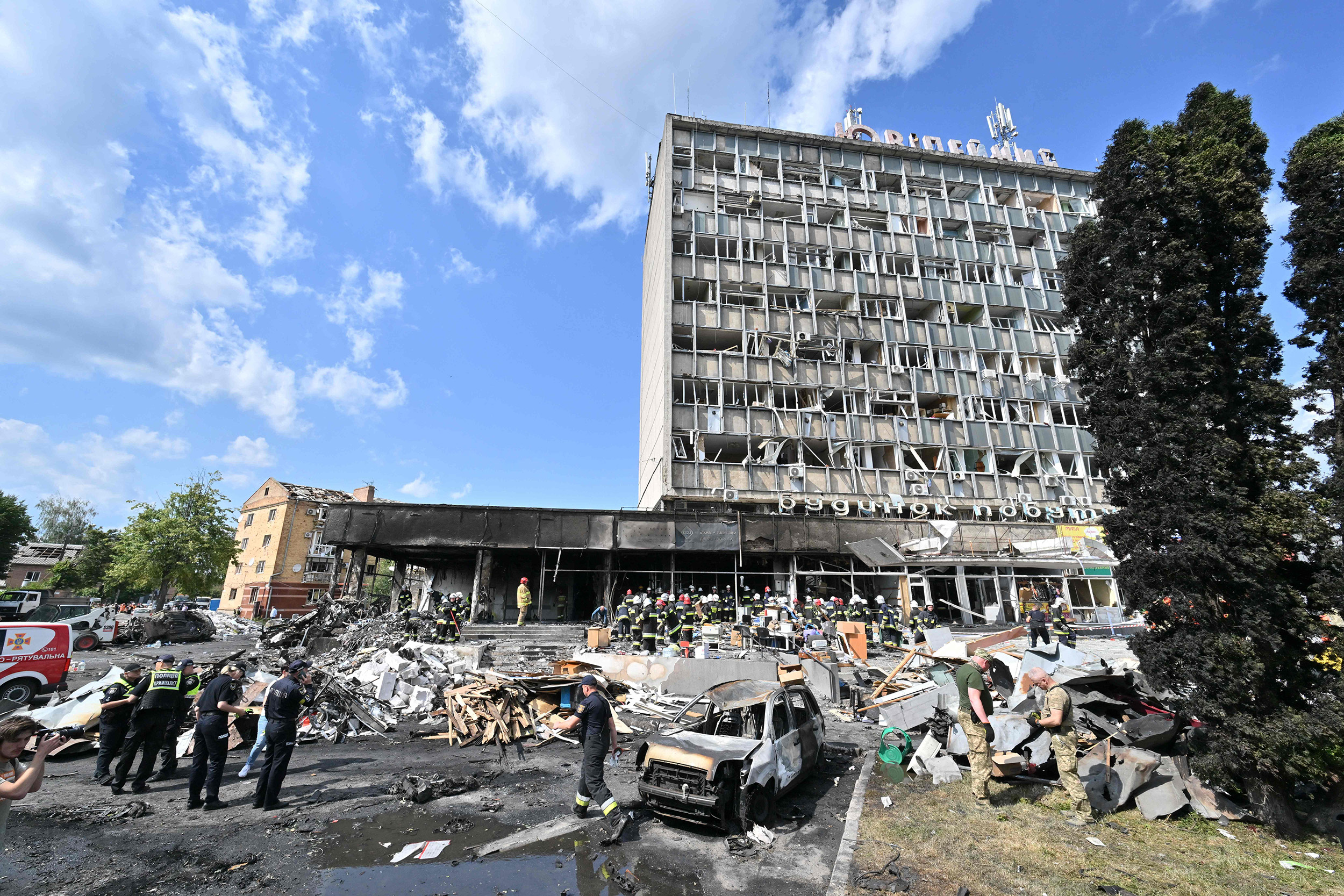Firefighters remove rubble out of a damaged building following a Russian airstrike in the city of Vinnytsia, Ukraine, on July 14.