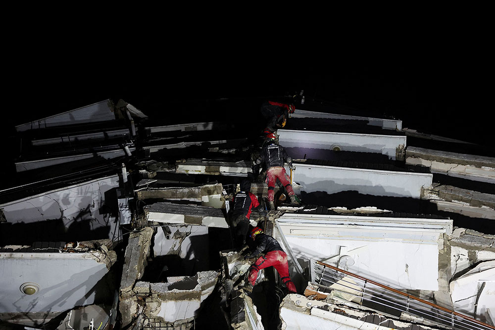 A rescue team works on a collapsed building in Antakya, Turkey.