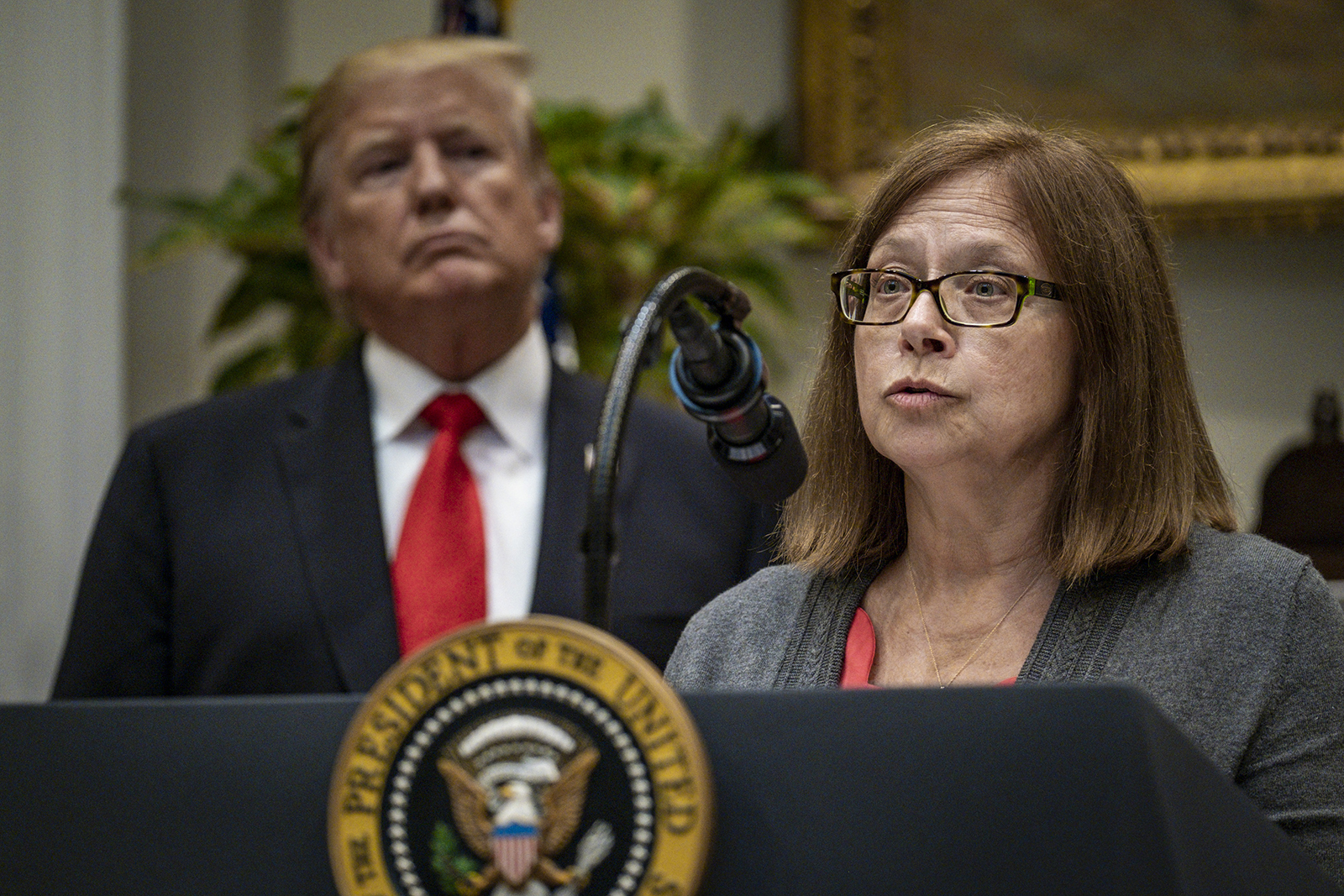 Elinore McCance-Katz, the assistant secretary for Mental Health and Substance Use, speaks while President Donald Trump, left, listens in the Roosevelt Room of the White House in Washington, DC, on September 4, 2019.