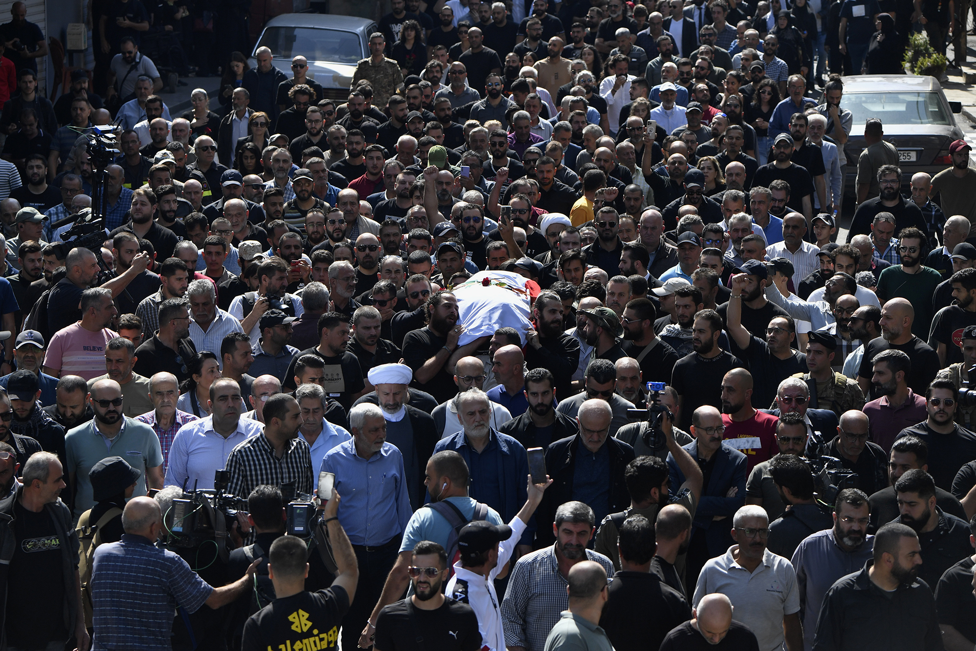 People attend Abdallah’s funeral ceremony in Khiam, Lebanon, on October 14. 