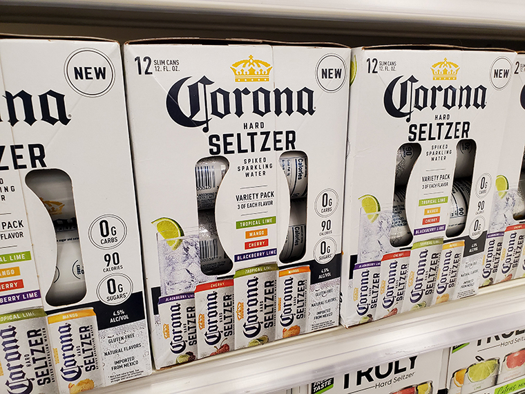 Packages of Corona brand hard seltzer, an alcoholic seltzer water drink, on store shelves in San Ramon, California, in July 2020. 
