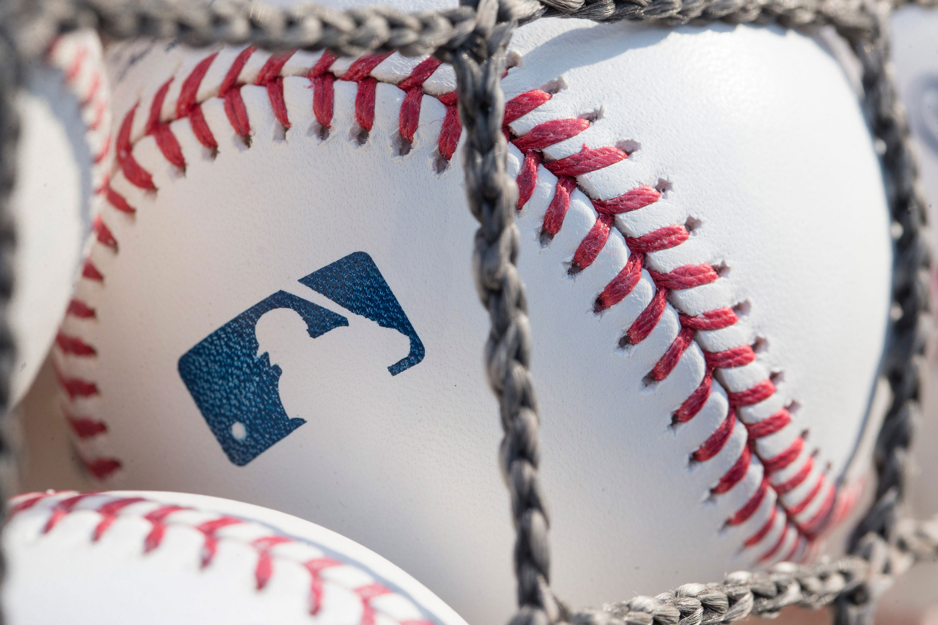 A baseball with MLB logo is seen on June 28, 2018 in Philadelphia, Pennsylvania. 