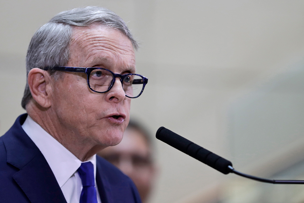 In this Thursday, February Ohio Governor Mike DeWine gives an update at MetroHealth Medical Center on the state's preparedness and education efforts to limit the potential spread of a new virus which caused a disease called COVID-19, Thursday, Feb. 27, in Cleveland. (AP Photo/Tony Dejak)