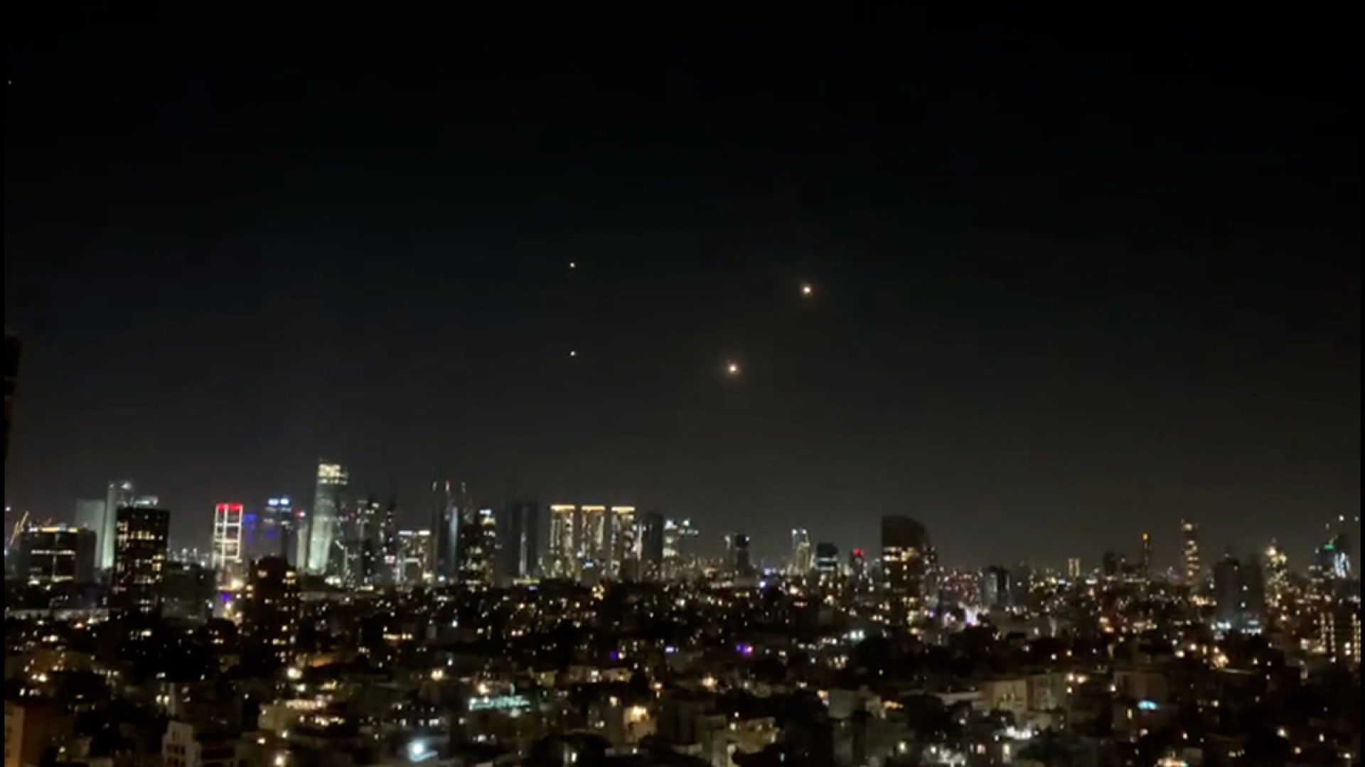 The Iron Dome defense system launches interceptors as sirens warn of incoming rockets over central Tel Aviv, Israel, on Saturday, December 2.