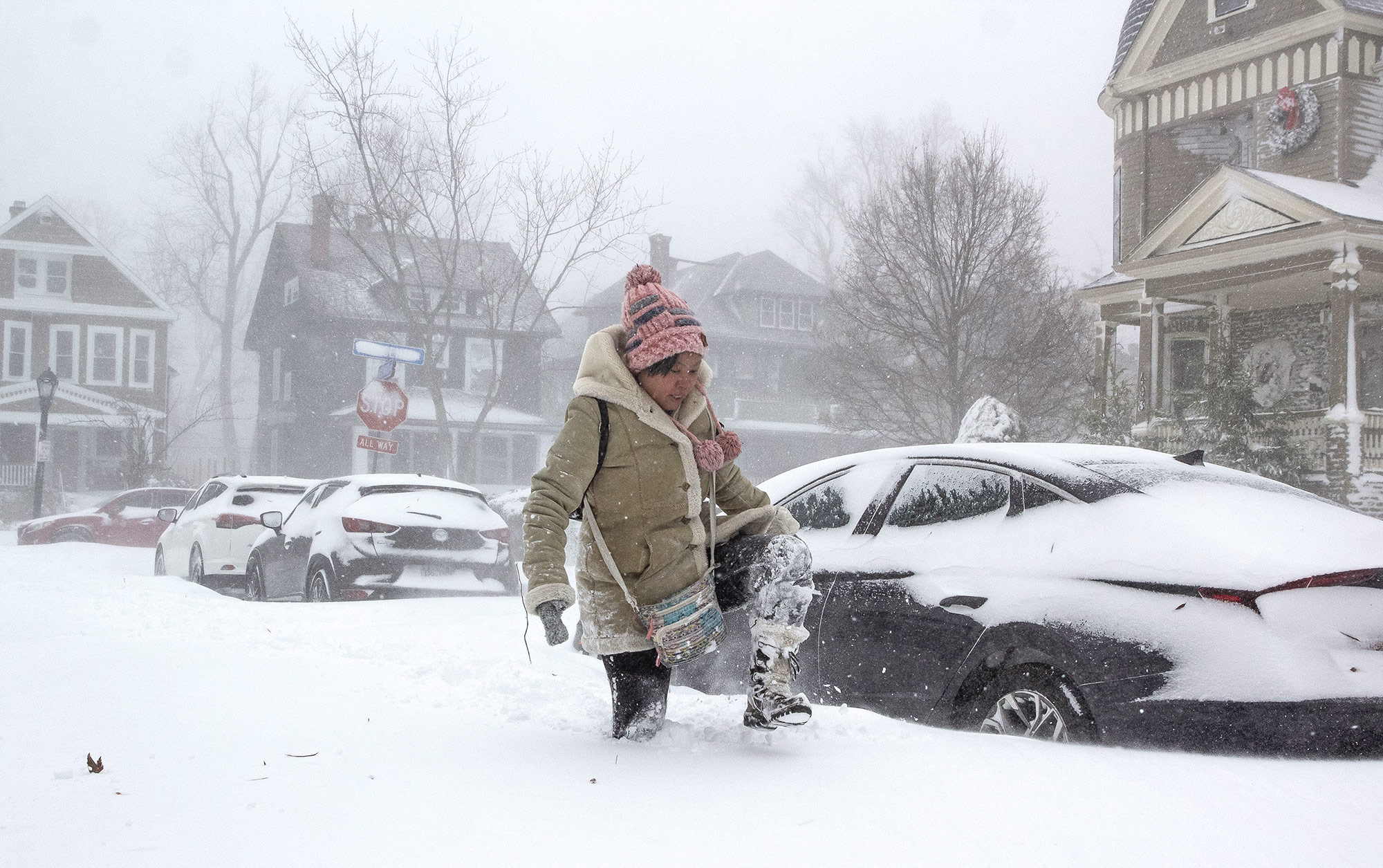 Jessica Chan navigates deep snow in Buffalo, New York, on December 24. 