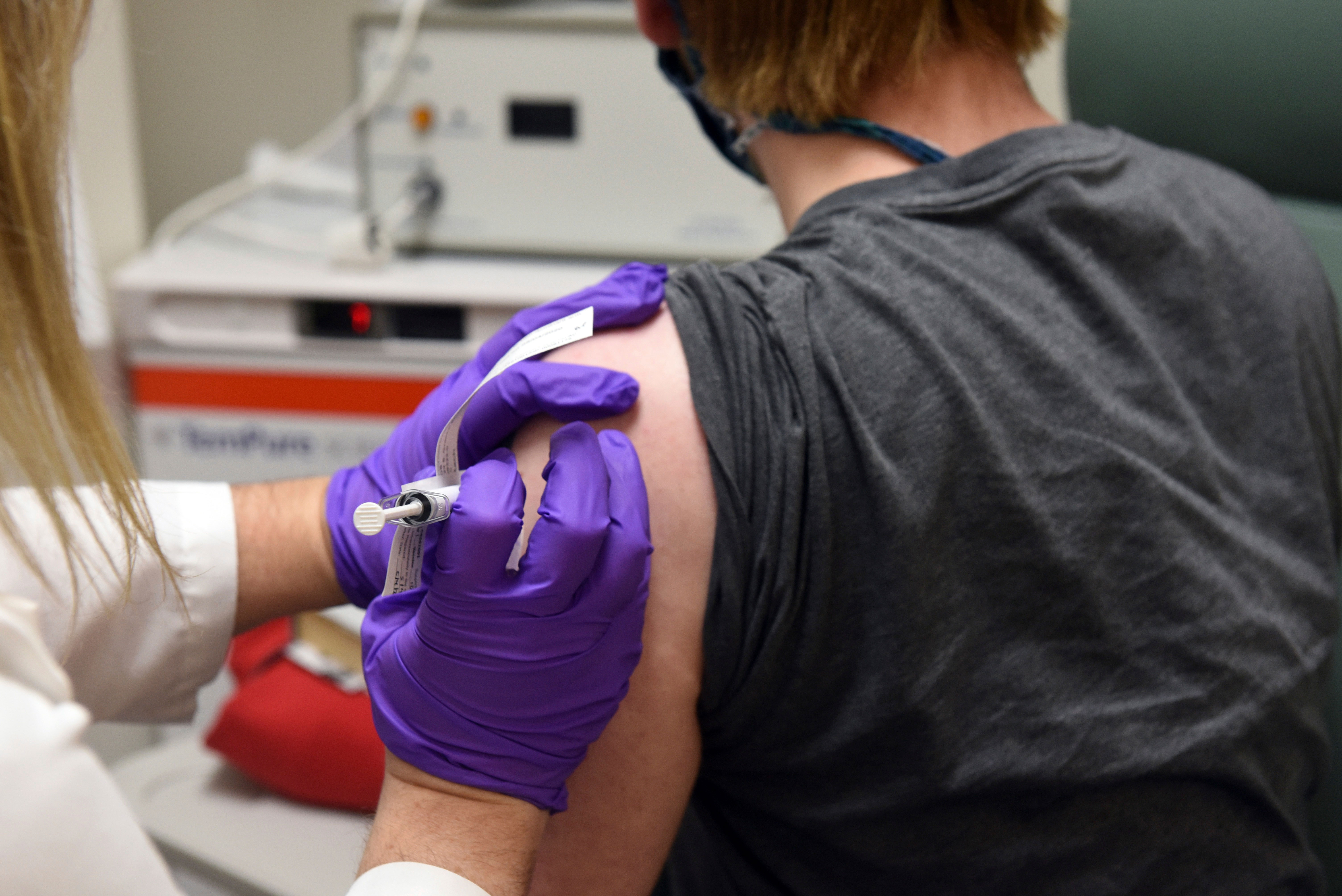 The first patient enrolled in Pfizer's coronavirus vaccine clinical trial is pictured at the University of Maryland School of Medicine in Baltimore on May 4.
