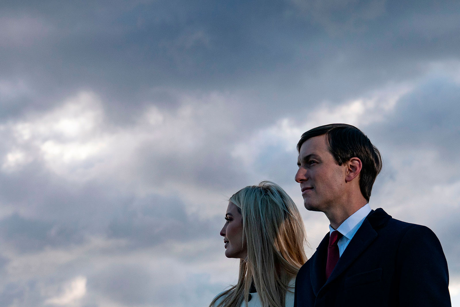 Ivanka Trump and her husband Jared Kushner stand on the tarmac at Joint Based Andrews in Maryland in January 2021.