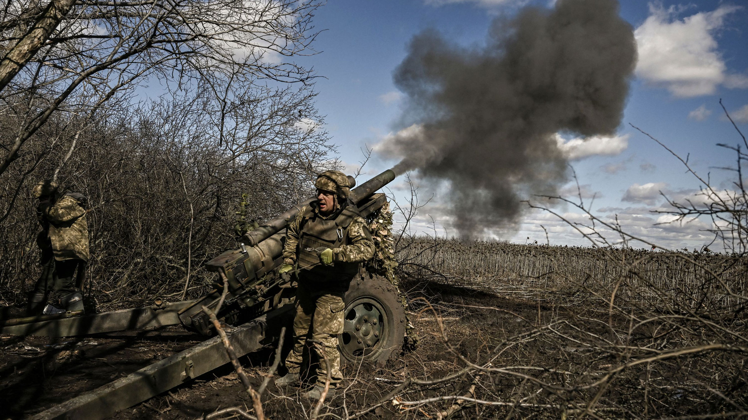 Ukrainian servicemen fire at Russian positions in the Donbas region last month.