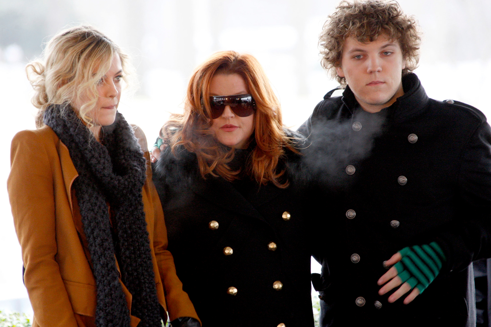 Lisa Marie Presley (C), with her children Riley and Benjamin Keough (R), attend the 75th birthday celebration for Elvis Presley in Memphis, Tennessee on January 8, 2010. 