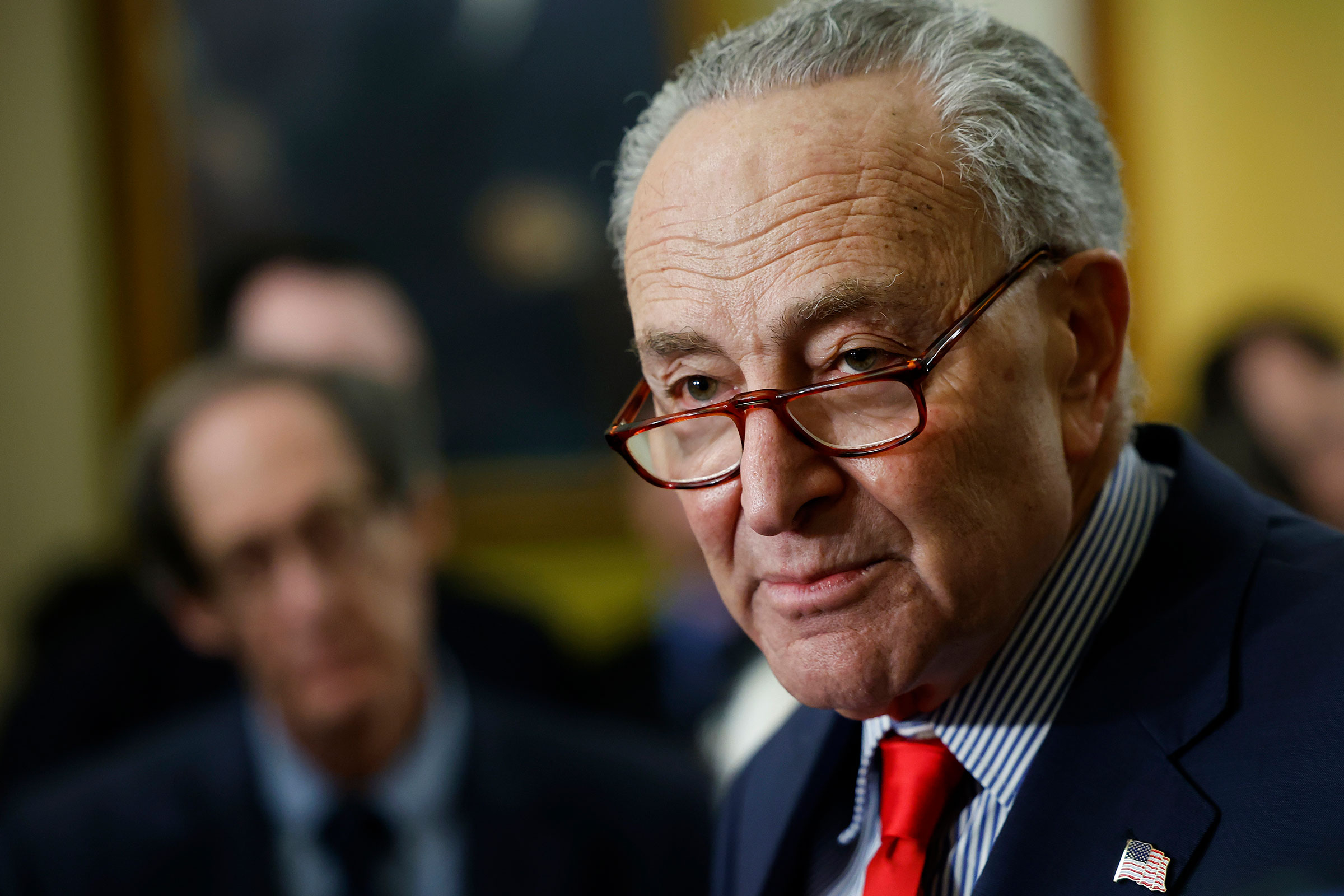 Senate Majority Leader Chuck Schumer speaks to reporters after the weekly Senate Democrats caucus policy luncheon at the US Capitol on March 12 in Washington, DC. 
