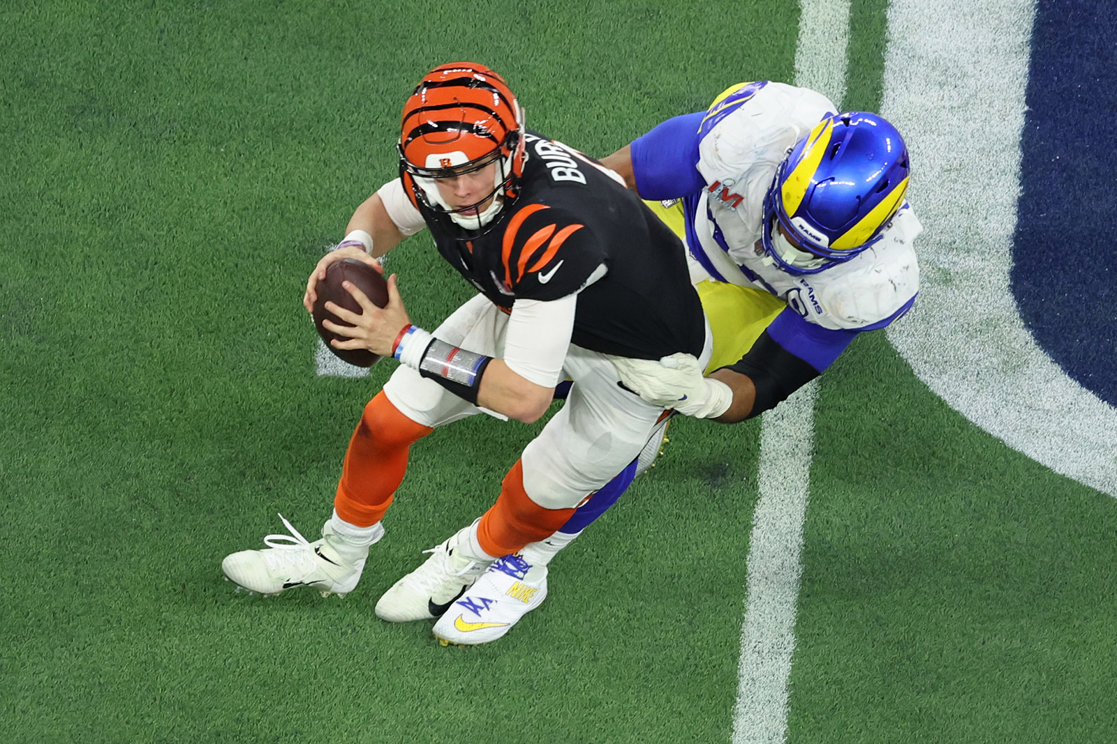 Los Angeles Rams defensive tackle Aaron Donald pressures Cincinnati Bengals quarterback Joe Burrow.