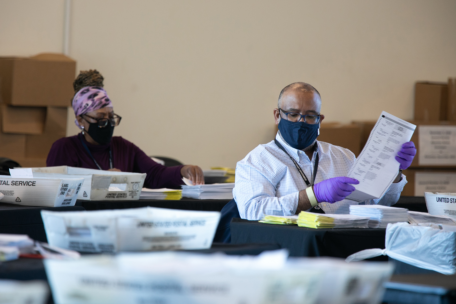 Election workers count Fulton County ballots at State Farm Arena in Atlanta, on November 4.