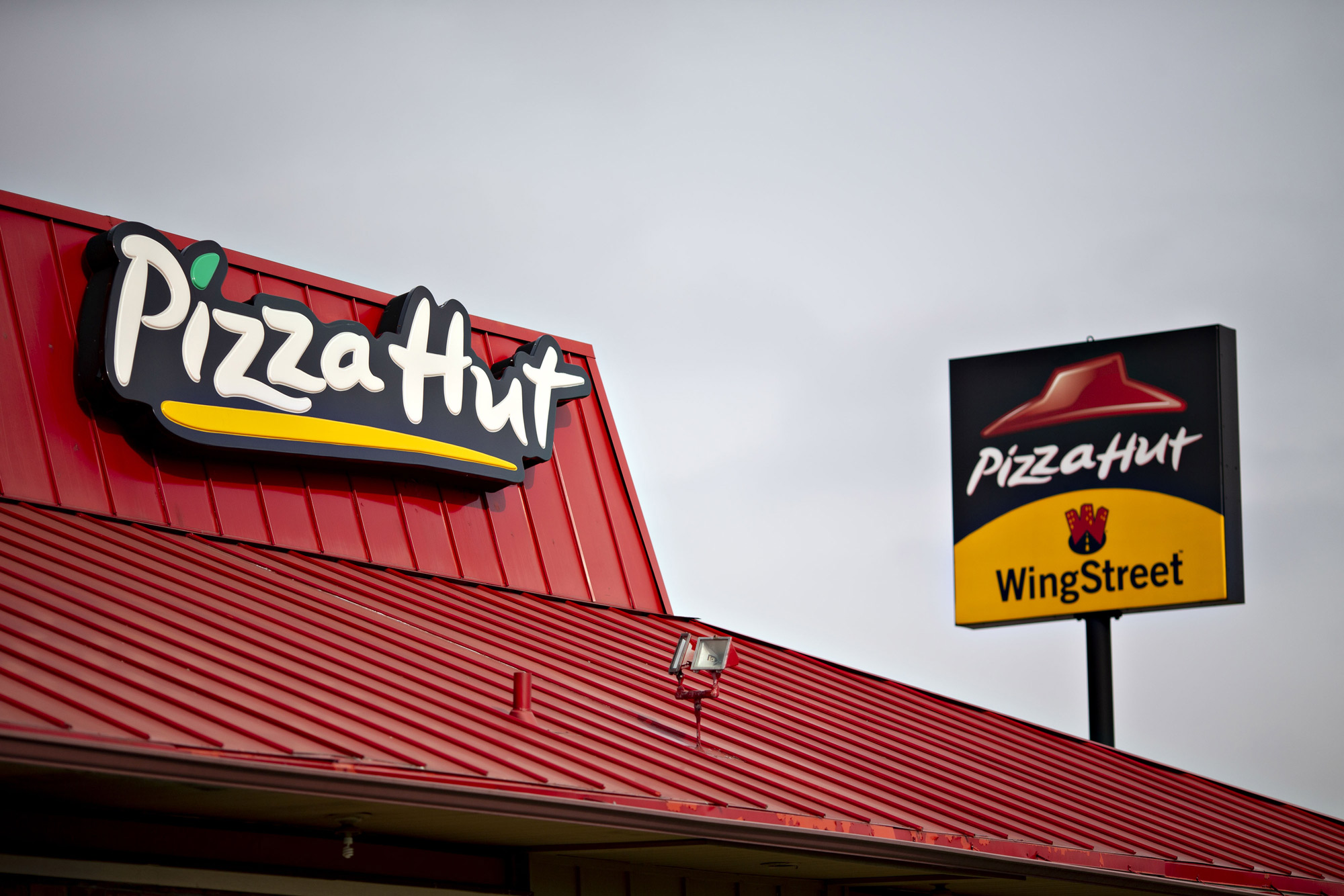 Signage is displayed outside a Yum! Brands Inc. Pizza Hut restaurant on February 5, 2019 in Illinois.