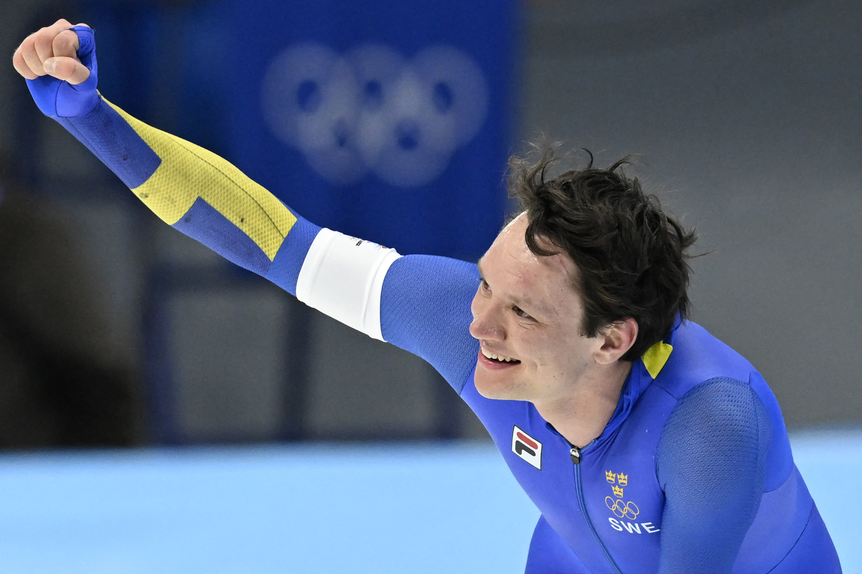 Sweden's Nils Van Der Poel celebrates winning the men's speed skating 5000m event on February 6.