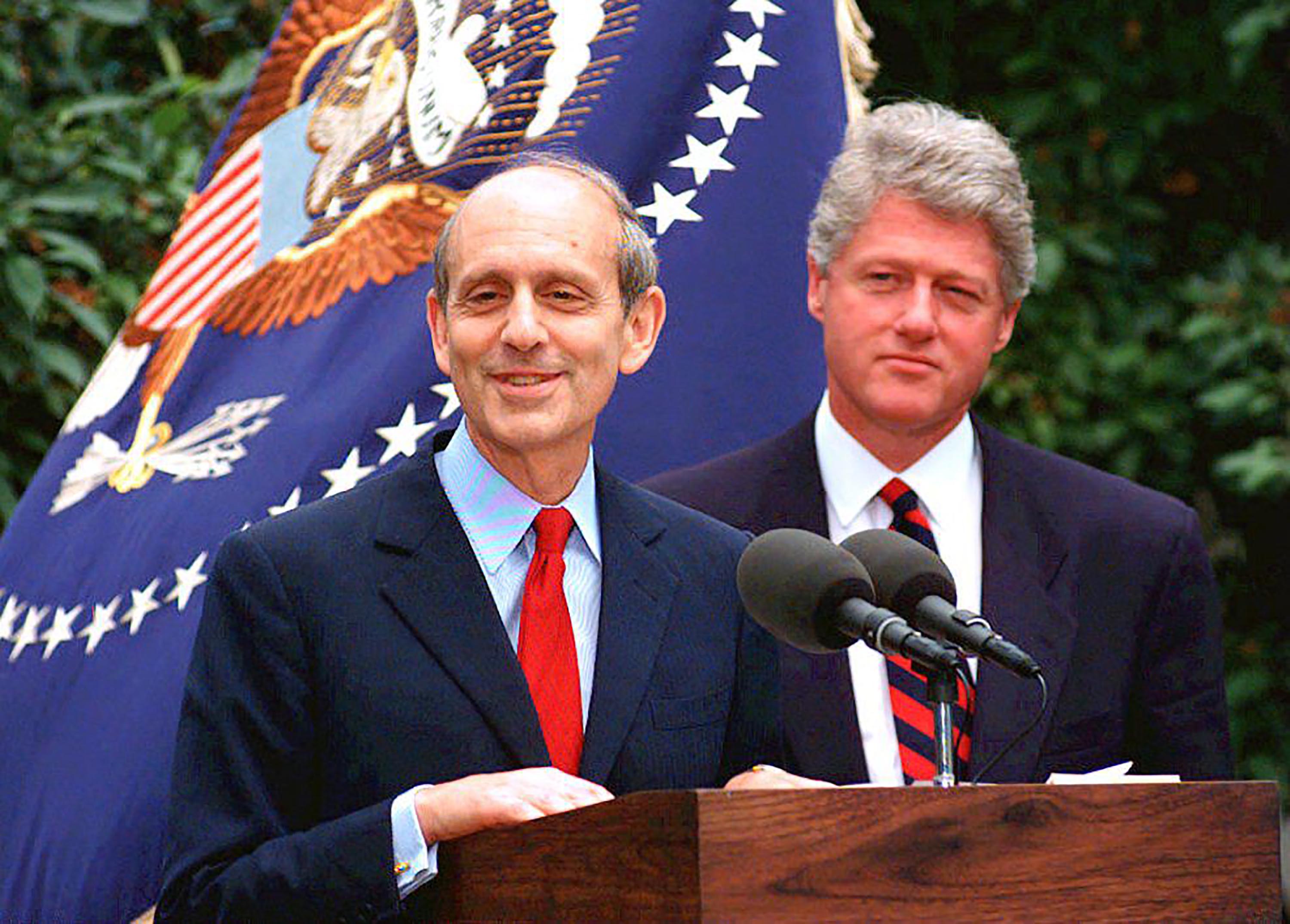 Then-Supreme Court nominee Judge Stephen Breyer speaks with reporters in May 1994 in the White House Rose Garden as US President Bill Clinton listens