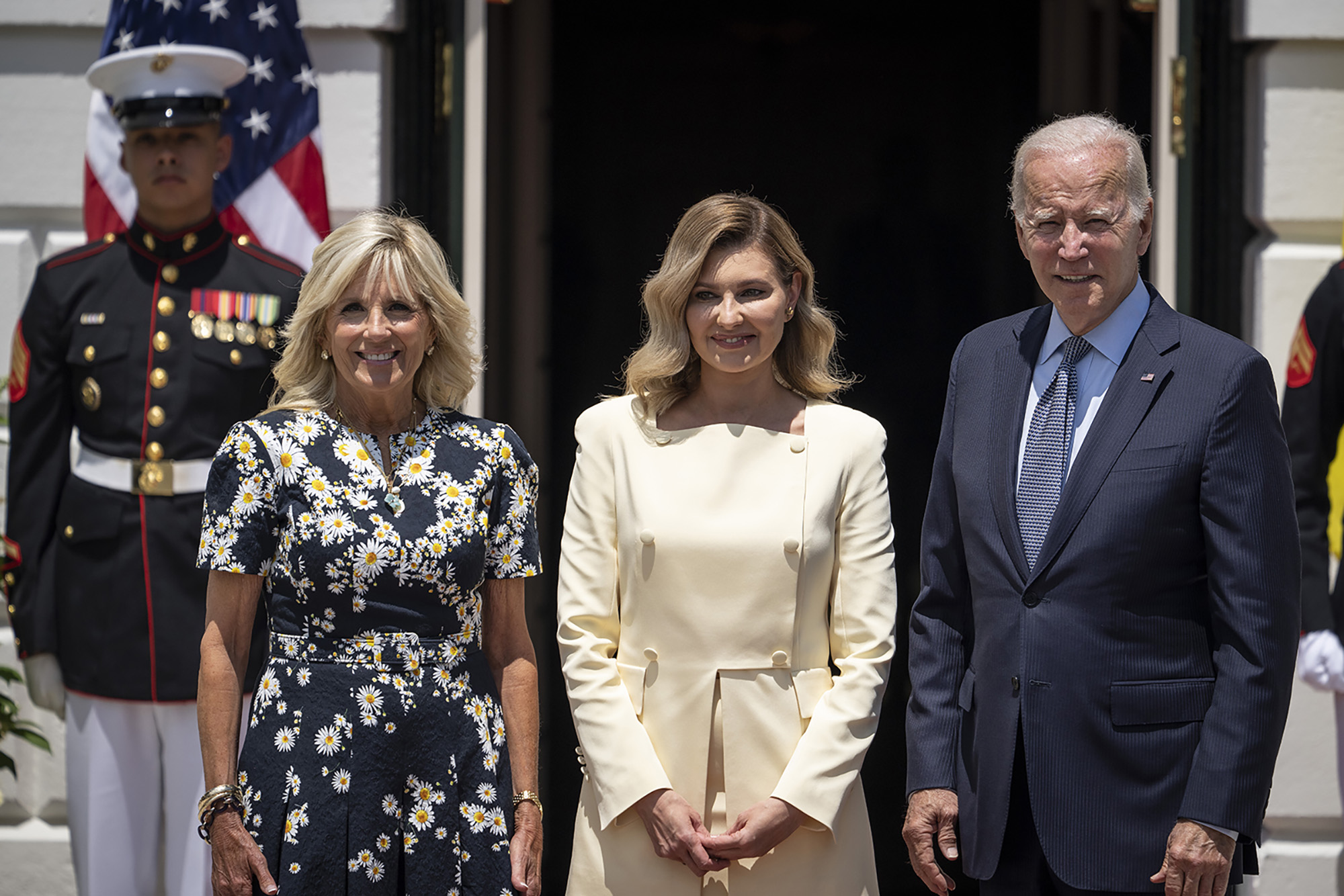 US first lady Jill Biden, first lady of Ukraine Olena Zelenska and US President Joe Biden pose for photos at the White House on Tuesday.