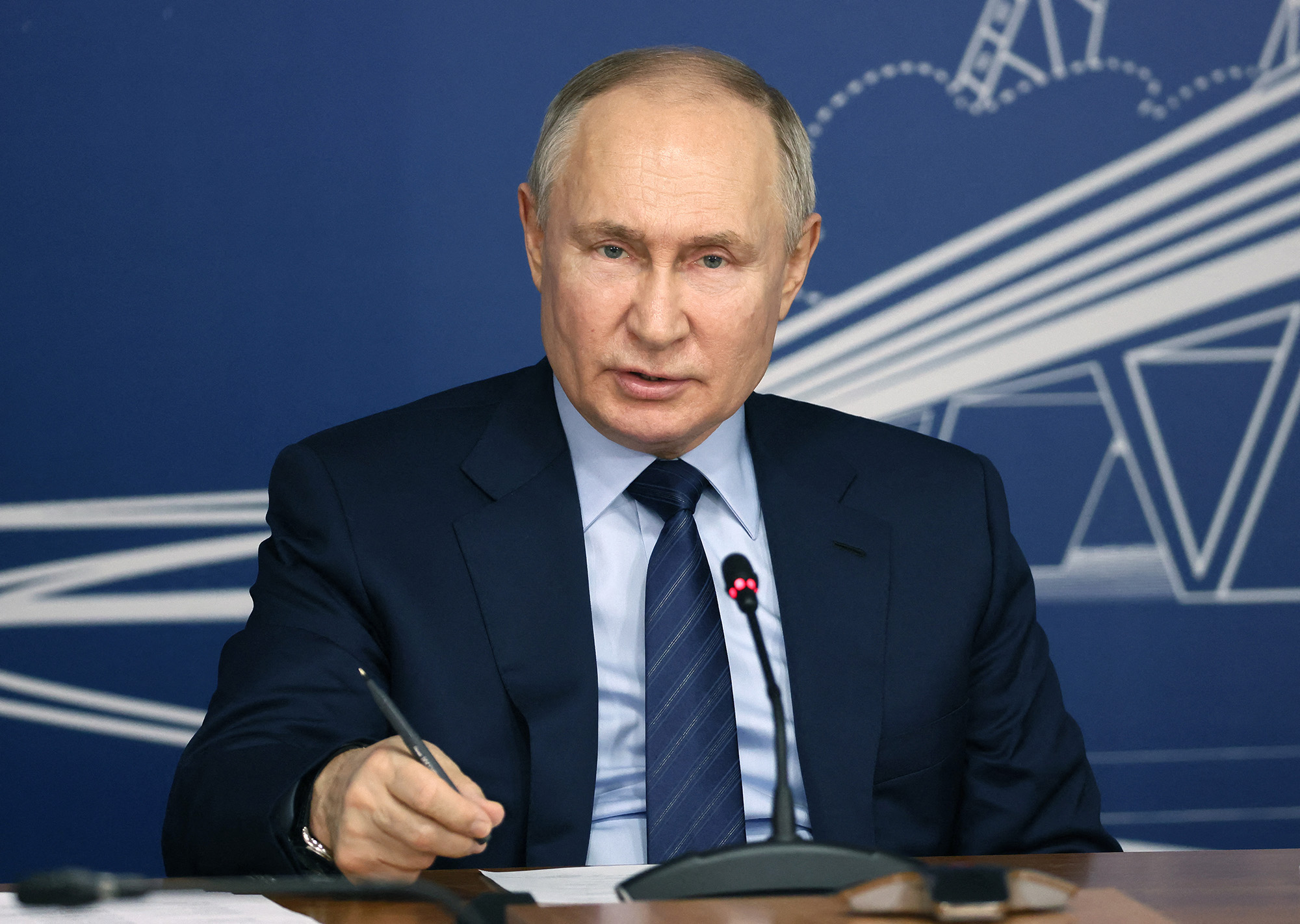 Russia's President Vladimir Putin holds a meeting on the implementation of the high speed railway service linking Moscow with St. Petersburg construction project in the town Verkhnyaya Pyshma on February 15.