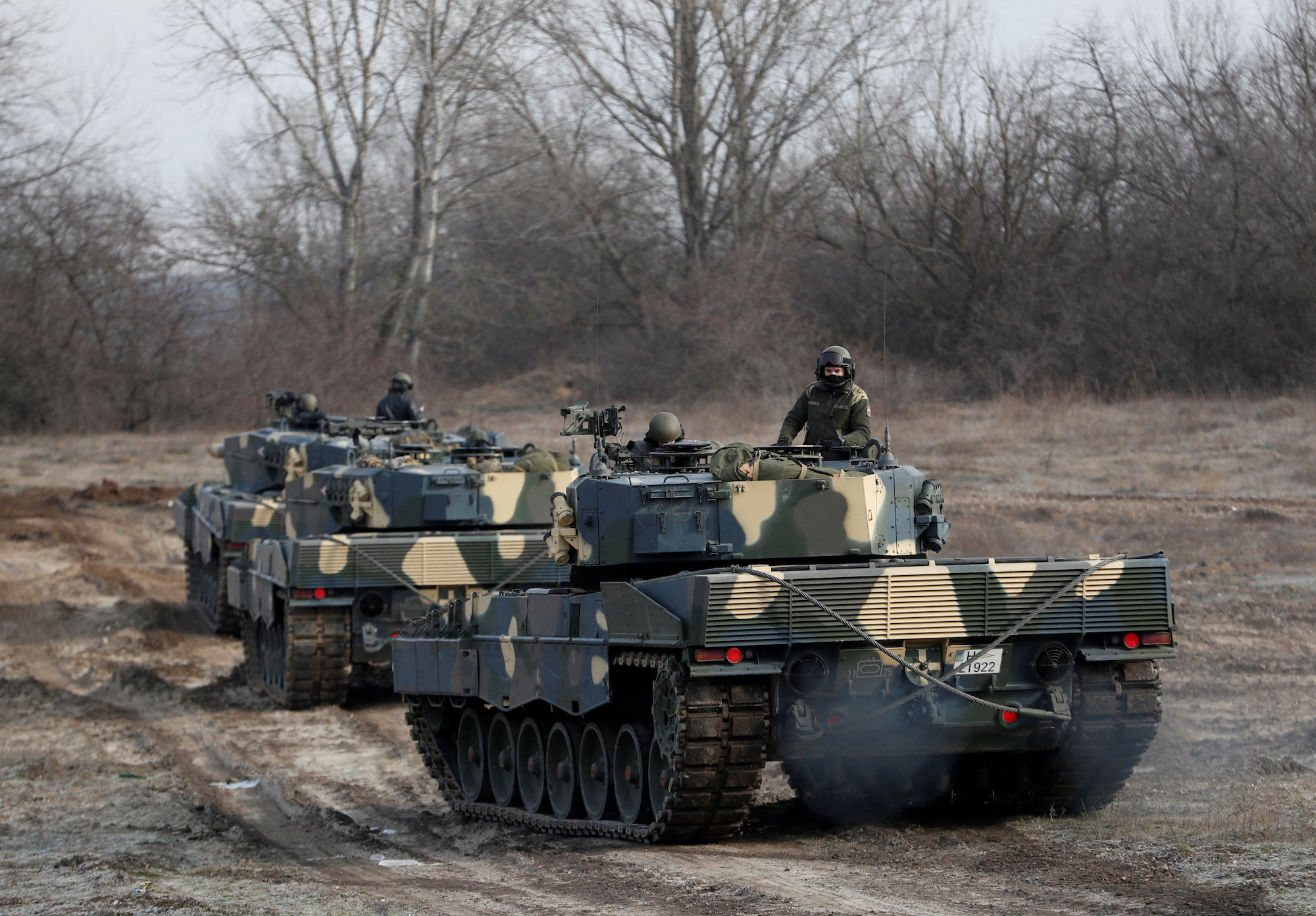 Leopard 2A4 tanks take part in training near Tata, Hungary on Monday.
