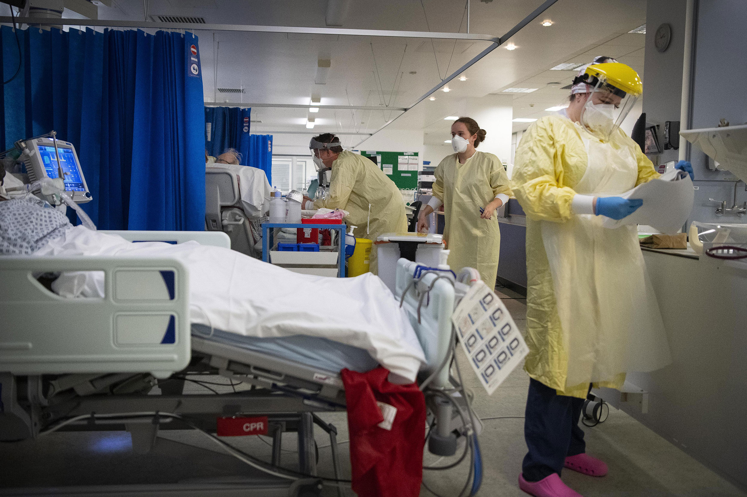 Nurses work on patients in the ICU at St George's Hospital in London on January 7.