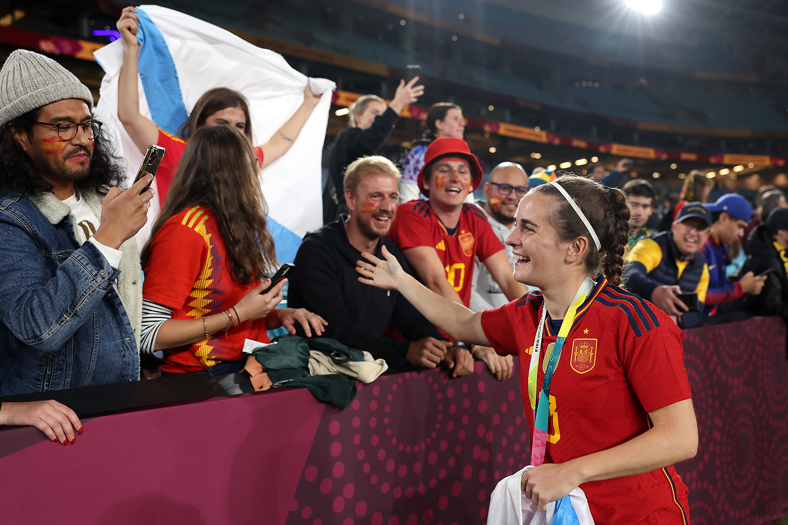 Spain’s Teresa Abelleira celebrates with fans after the team's victory on August 20. 