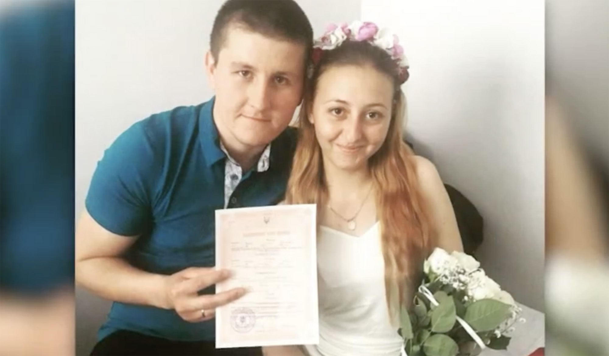 Viktor and Oksana Balandina pose on their wedding day.
