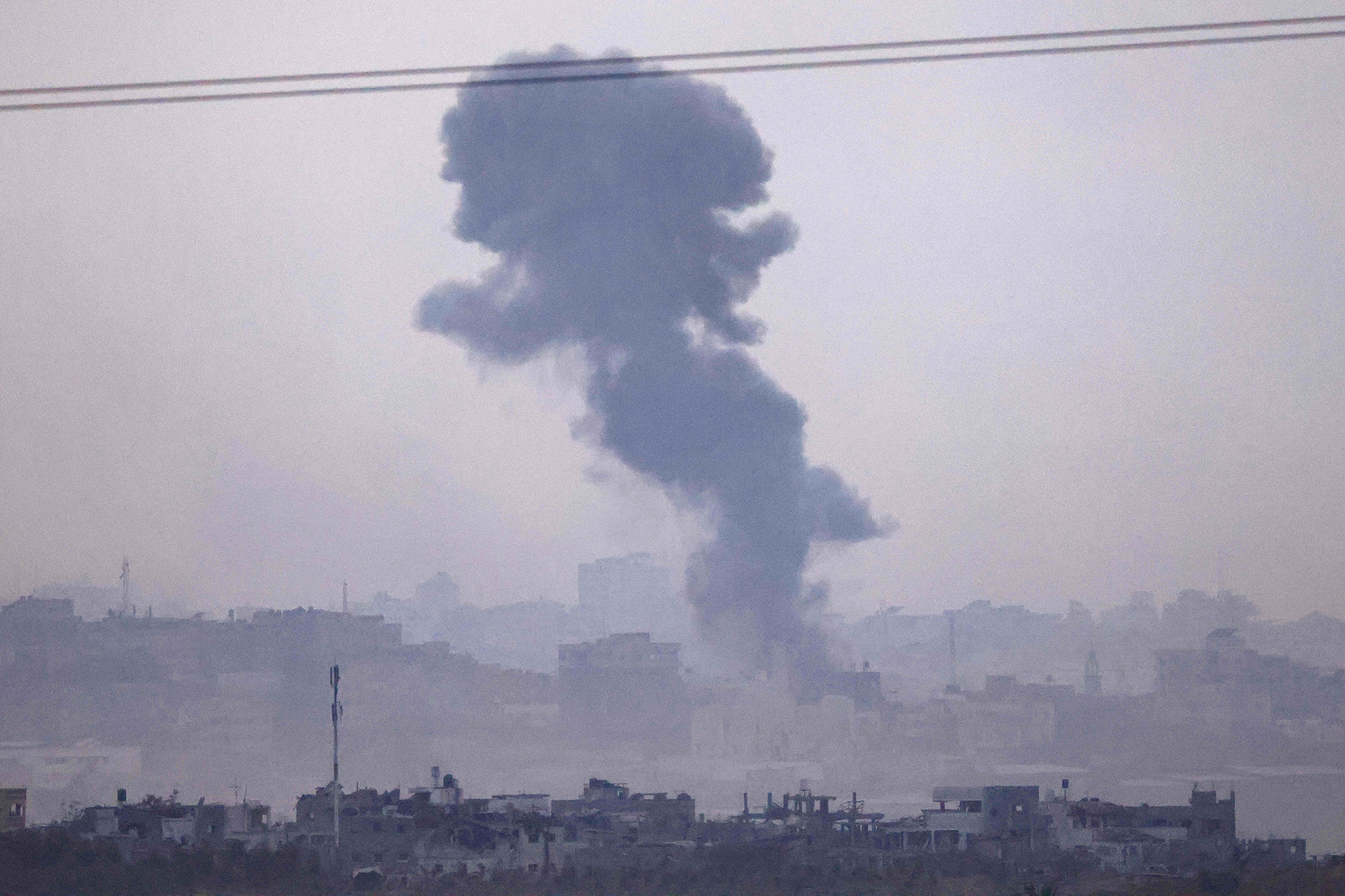 Smoke rises over Gaza following an Israeli strike on November 11. 