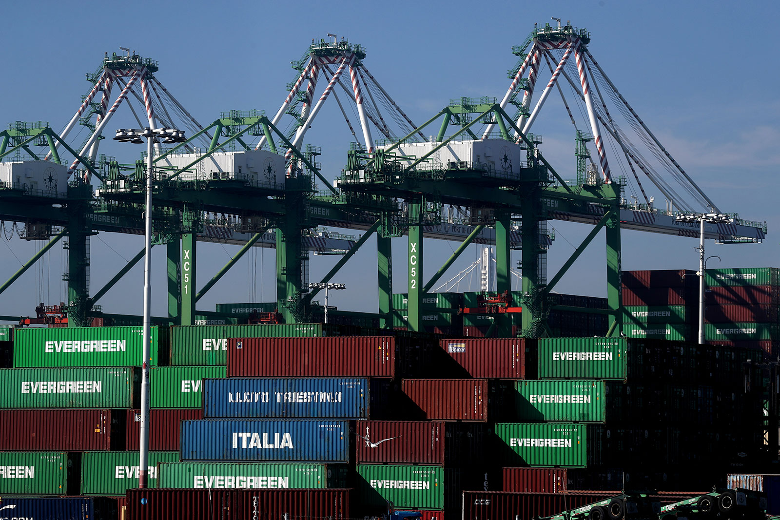 Stacks of shipping containers sit at the Port of Oakland in Oakland, California.