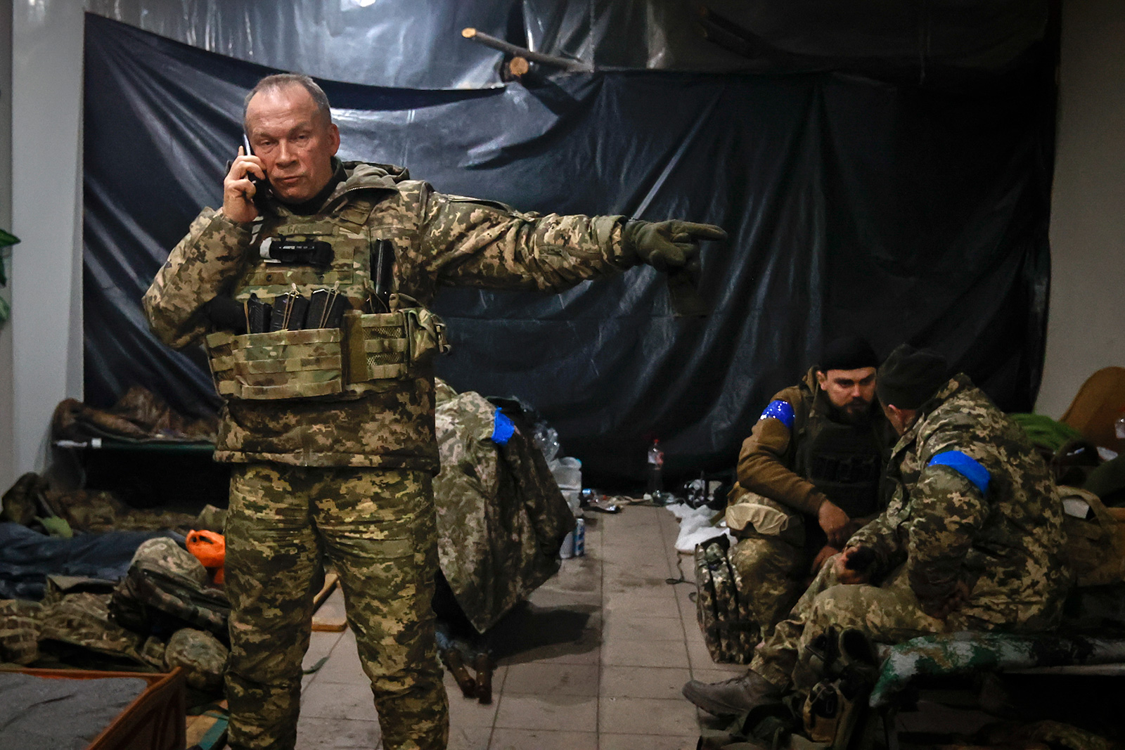 Commander of the Ukrainian army, Col. Gen. Oleksandr Syrskyi, gives instructions in a shelter in Soledar, in the Donetsk region of Ukraine, on Sunday, January 8. 