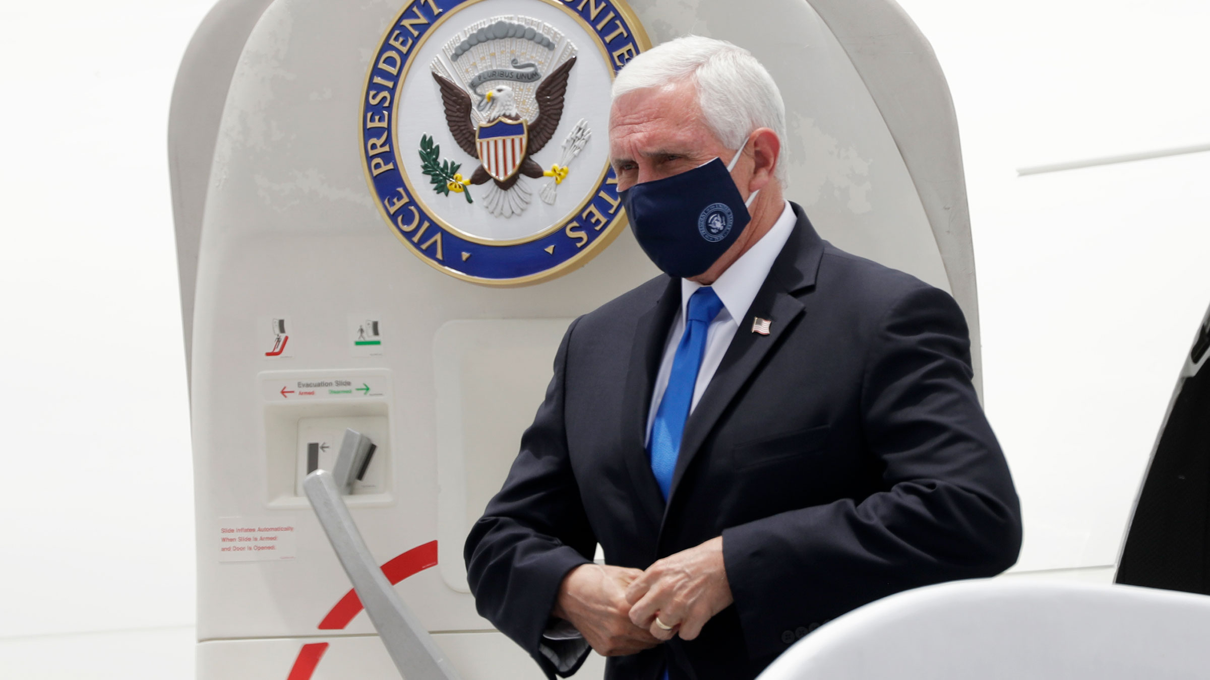 Vice President Mike Pence arrives at Miami International Airport on Monday.