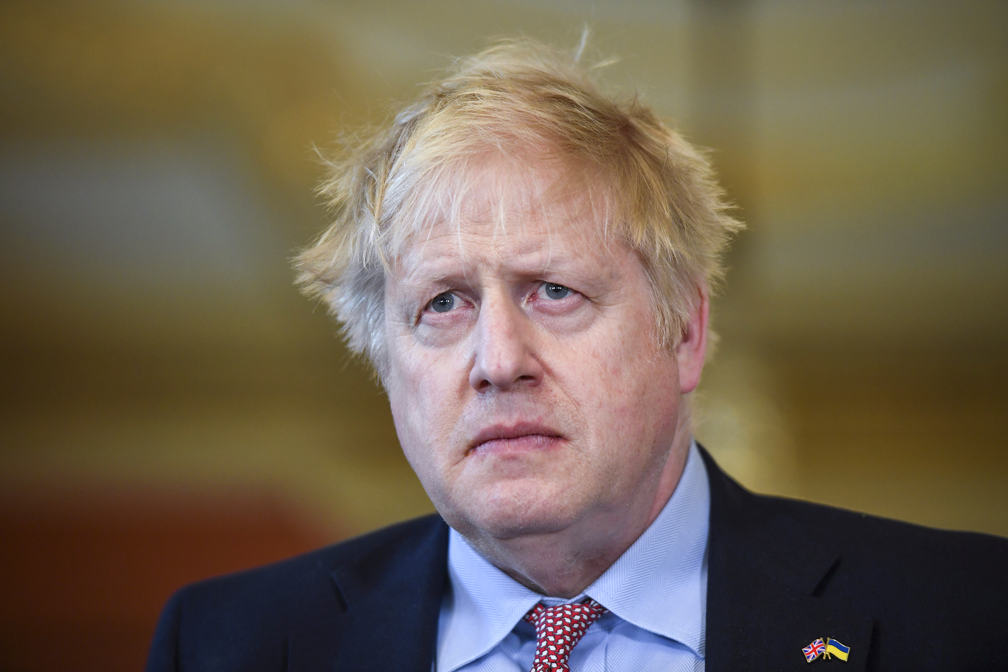 UK Prime Minister Boris Johnson speaks to the media in London on April 7. 