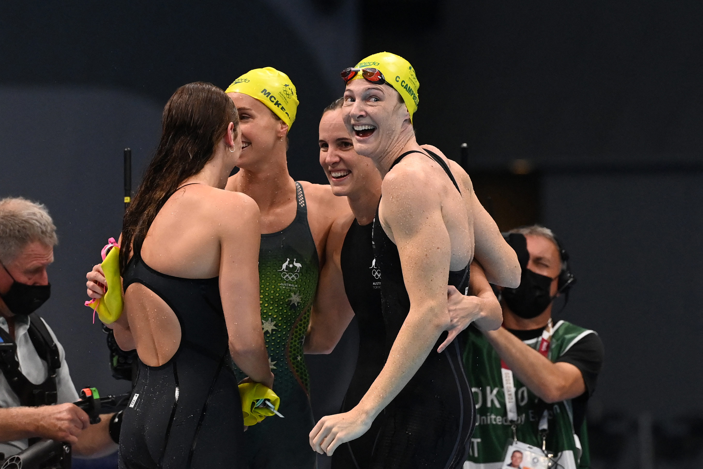 Australia's Cate Campbell and teammates celebrate after setting a world record and winning the final of the women's 4x100m freestyle relay swimming event on July 25.