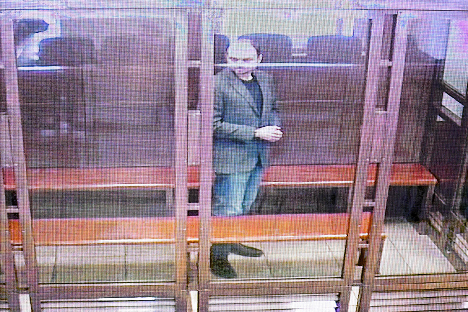A screen set up at a hall of the Moscow City Court shows live feed of the verdict in the case against Vladimir Kara-Murza in Moscow on April 17.