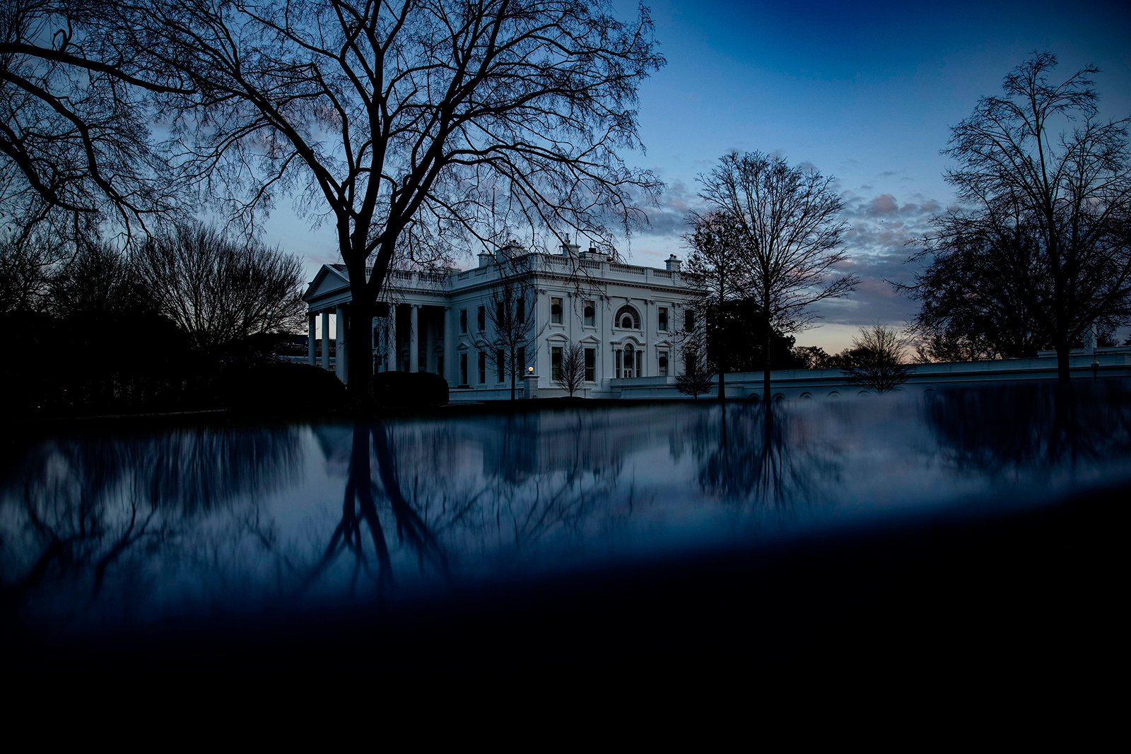 The sun sets over the White House in Washington, DC on December 21.