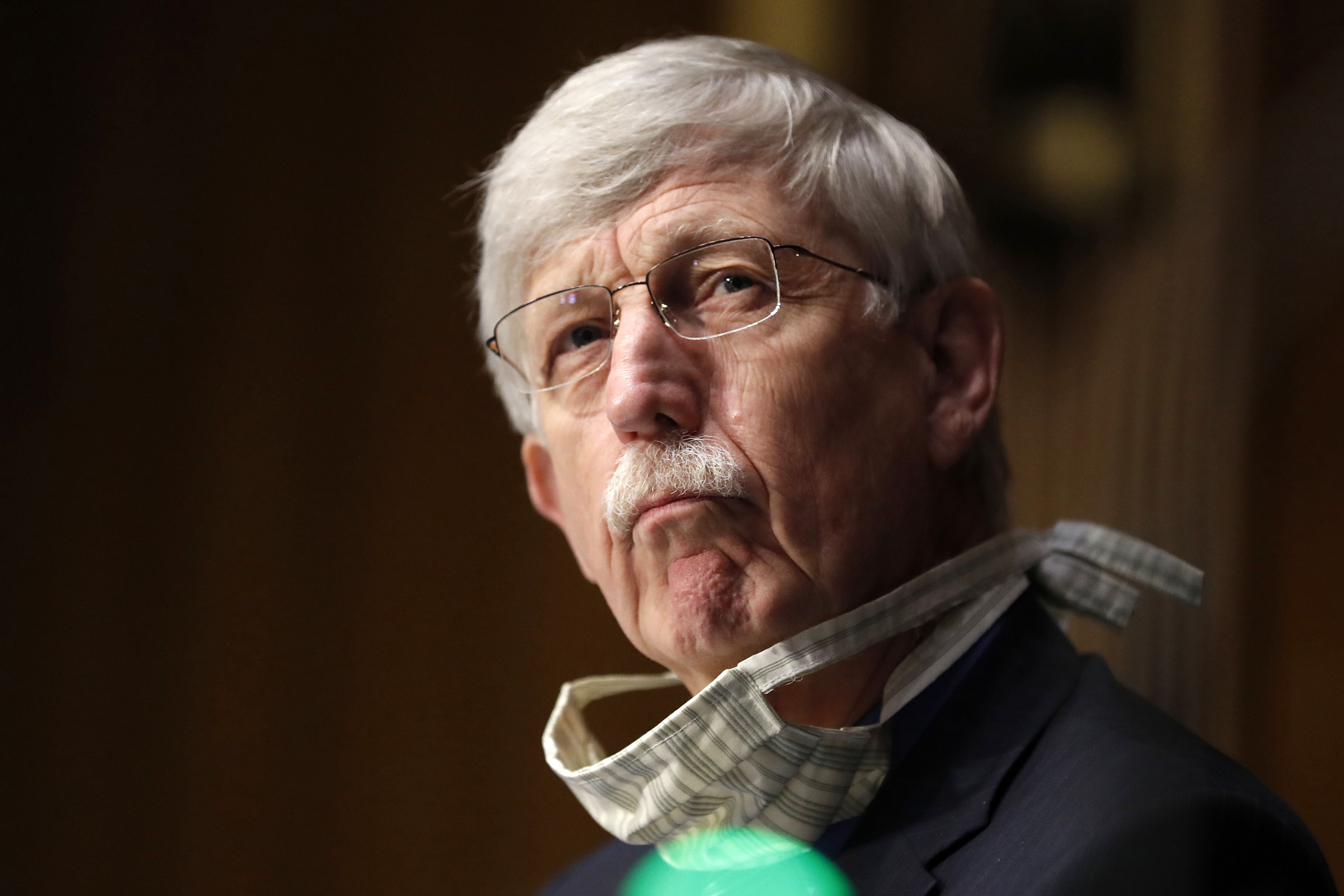 Dr. Francis Collins, director of the National Institutes of Health (NIH), listens during a hearing in Washington, DC, on May 7.