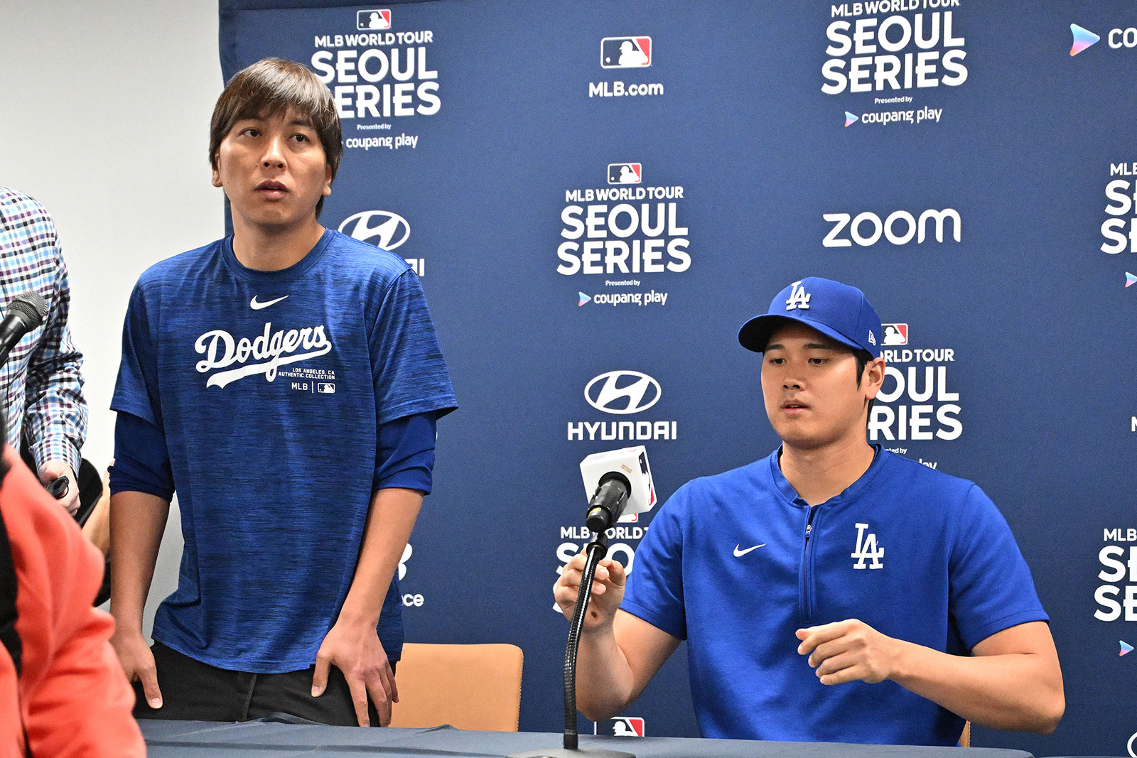 Shohei Ohtani, right, and his interpreter Ippei Mizuhara  attended a press conference at Gocheok Sky Dome in Seoul on March 16.